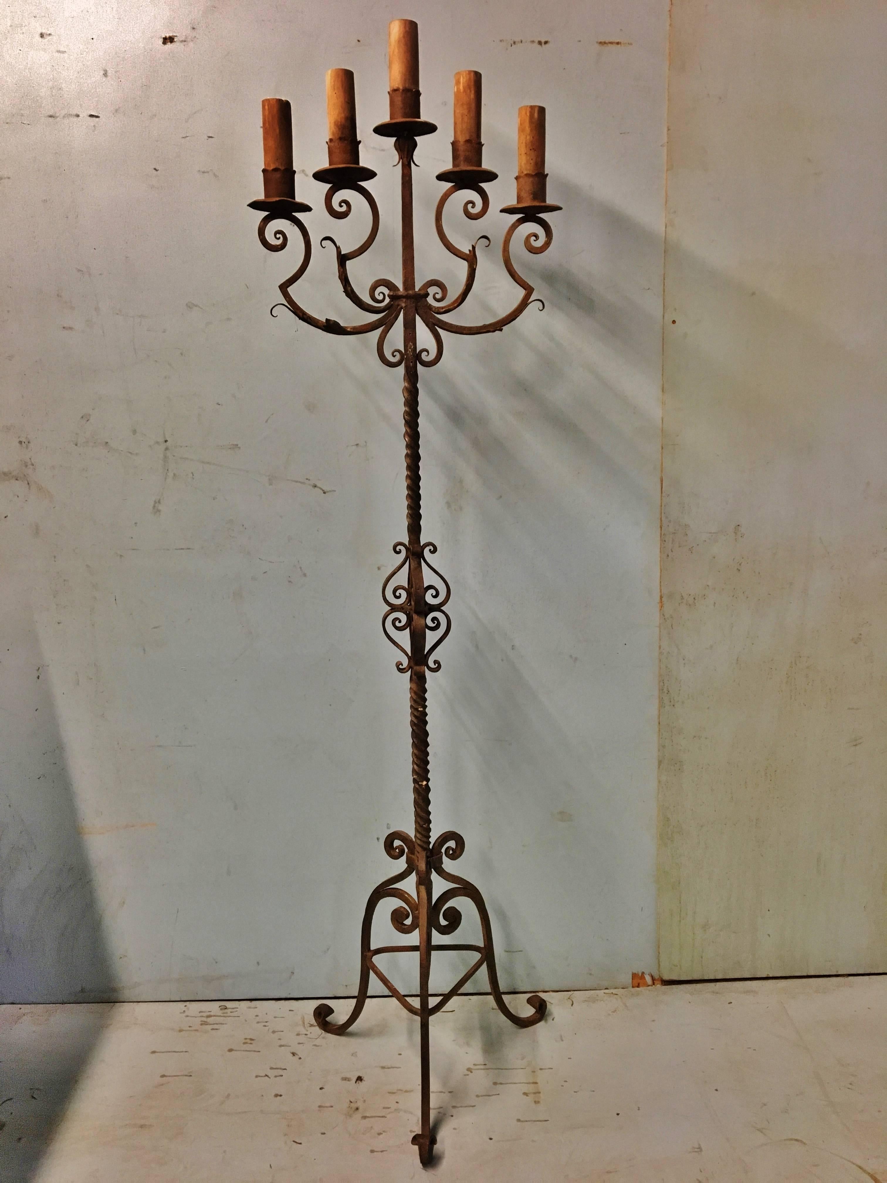 Lovely old early 20th century hand-forged steel candelabra with five sconces and wooden insets. This delightful item retains the full effects of age with rust and steel working together to produce a great patina. 

