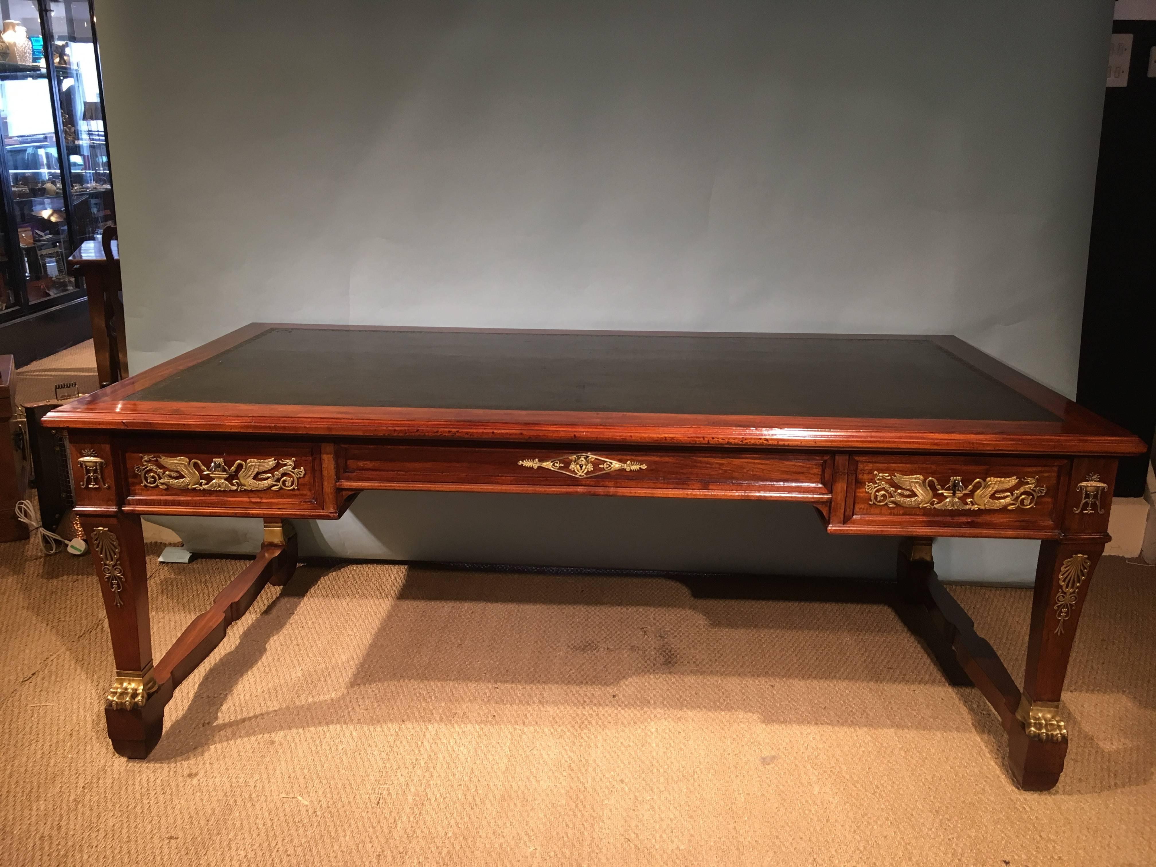 Truly stunning late 19th century mahogany and ormolu-mounted large Empire style writing table 

This piece is French dating circa 1880s constructed from solid mahogany, the three drawers are all lined with solid oak and all have working locks and