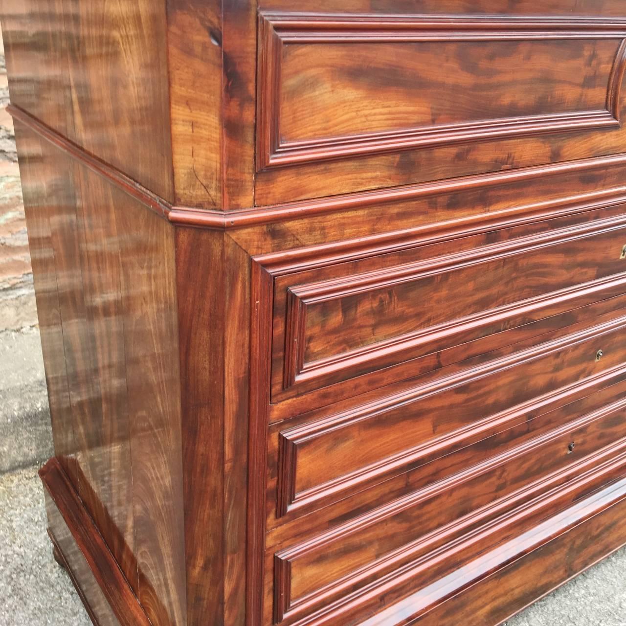 Antique mahogany secretaire chest of drawers in excellent condition. French, and dated to about 1860, it has been beautifully maintained by former owners andis seen here in excellent condition. The entire chest is veneered in the most attractive
