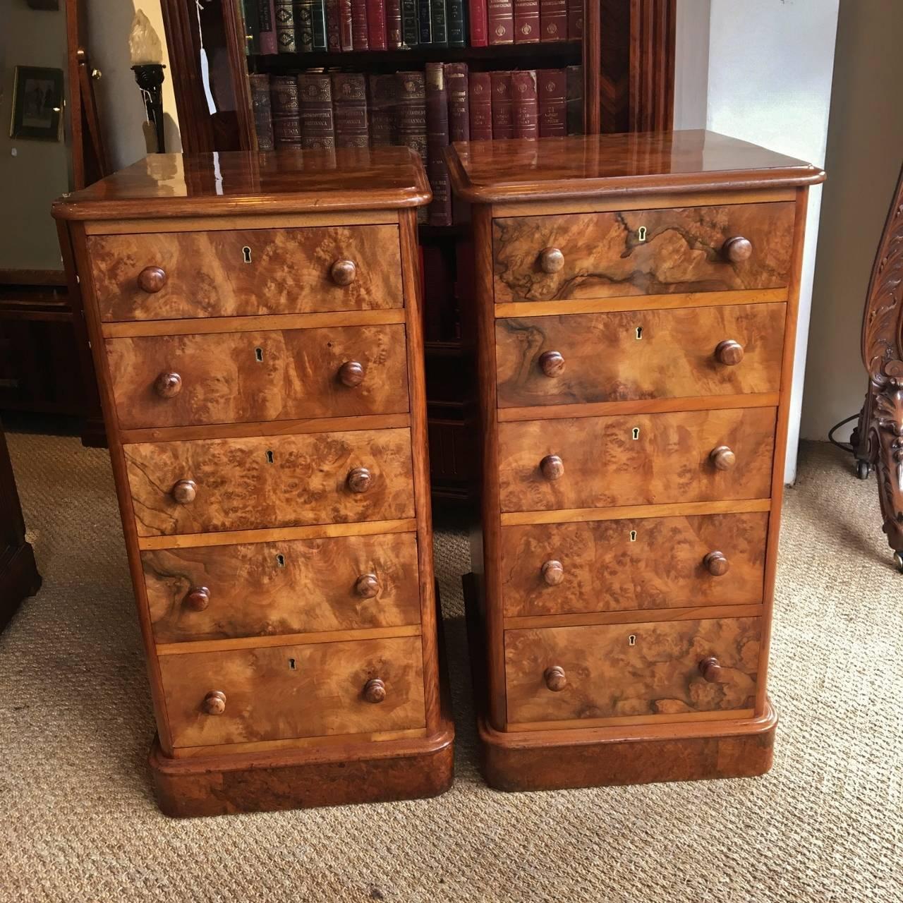 A most attractive pair of antique figured walnut bedside cabinets, circa 1860

These cabinets were made by skilled craftsmen with solid ash drawer linings and hand cut dovetails. There are five smoothly running drawers in each cabinet all with