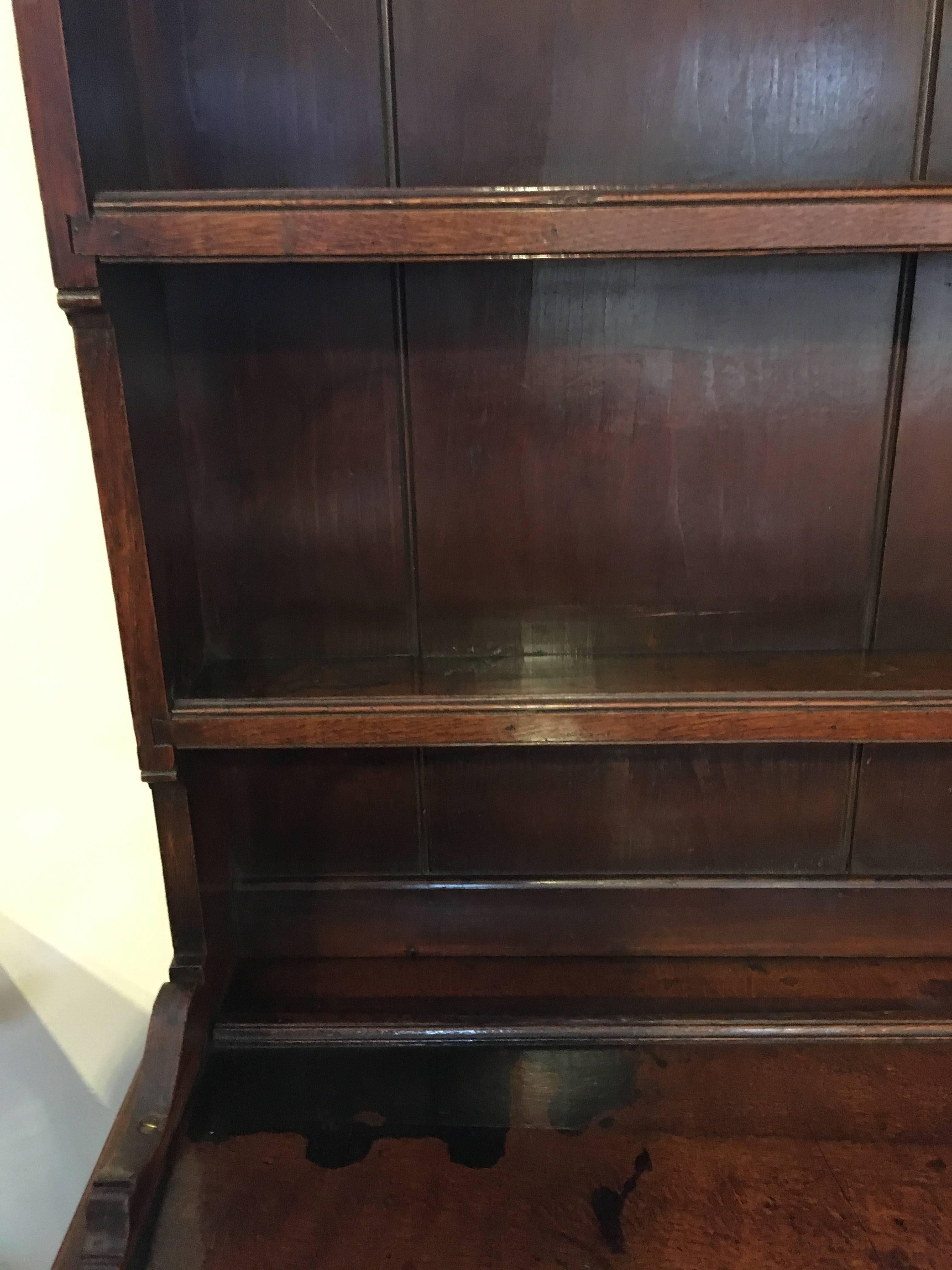 Good Welsh oak dresser dating to circa 1850

Lovely color / patination, unusual potboard design 

This piece has been through our workshops. Been cleaned polished and is ready to be placed in your home 

Measures: Height 86 inches 
Width 72