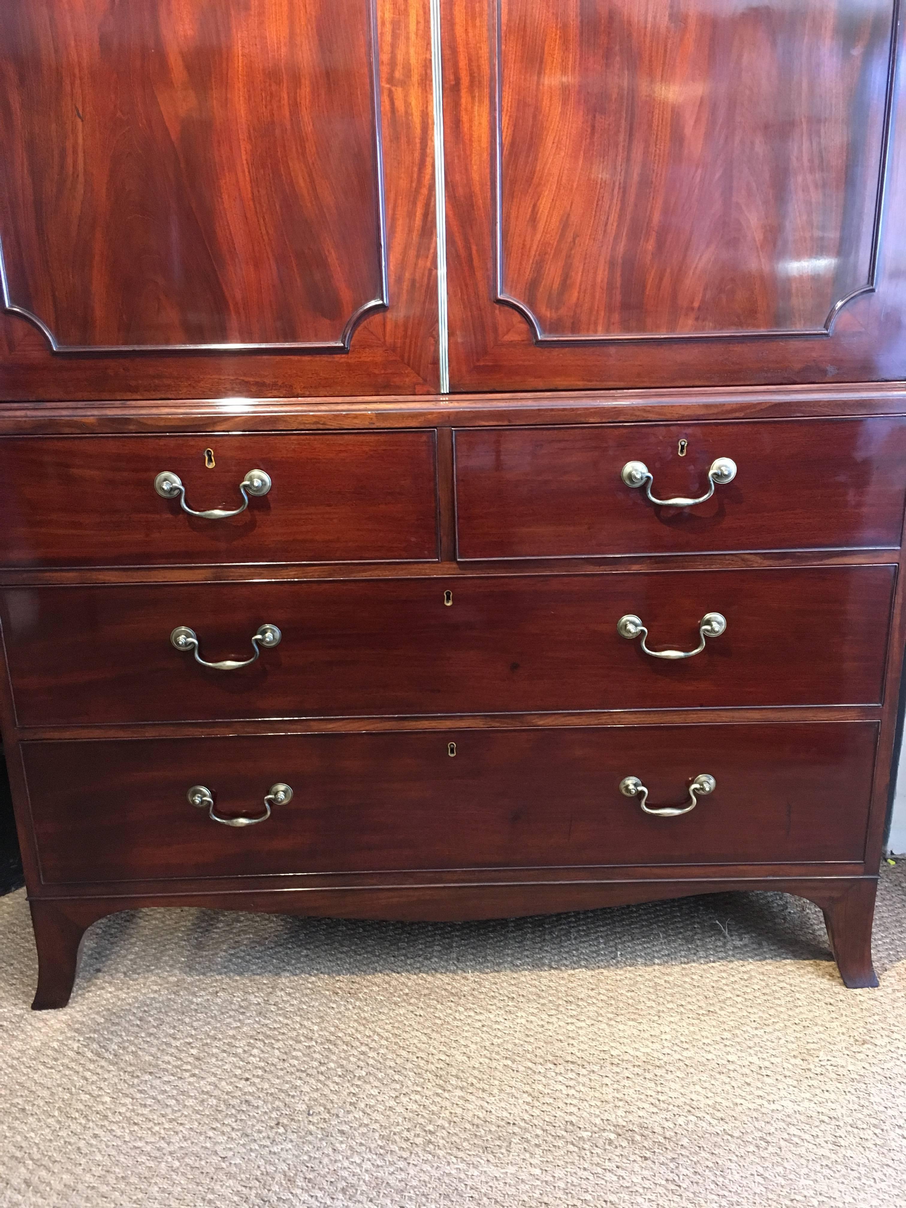 Very good quality, early 19th century 

English dating to circa 1820s with original brass swan neck handles, kickout bracket feet, all its slides 

This piece has been through our workshops been cleaned / polished all the drawers run smoothly