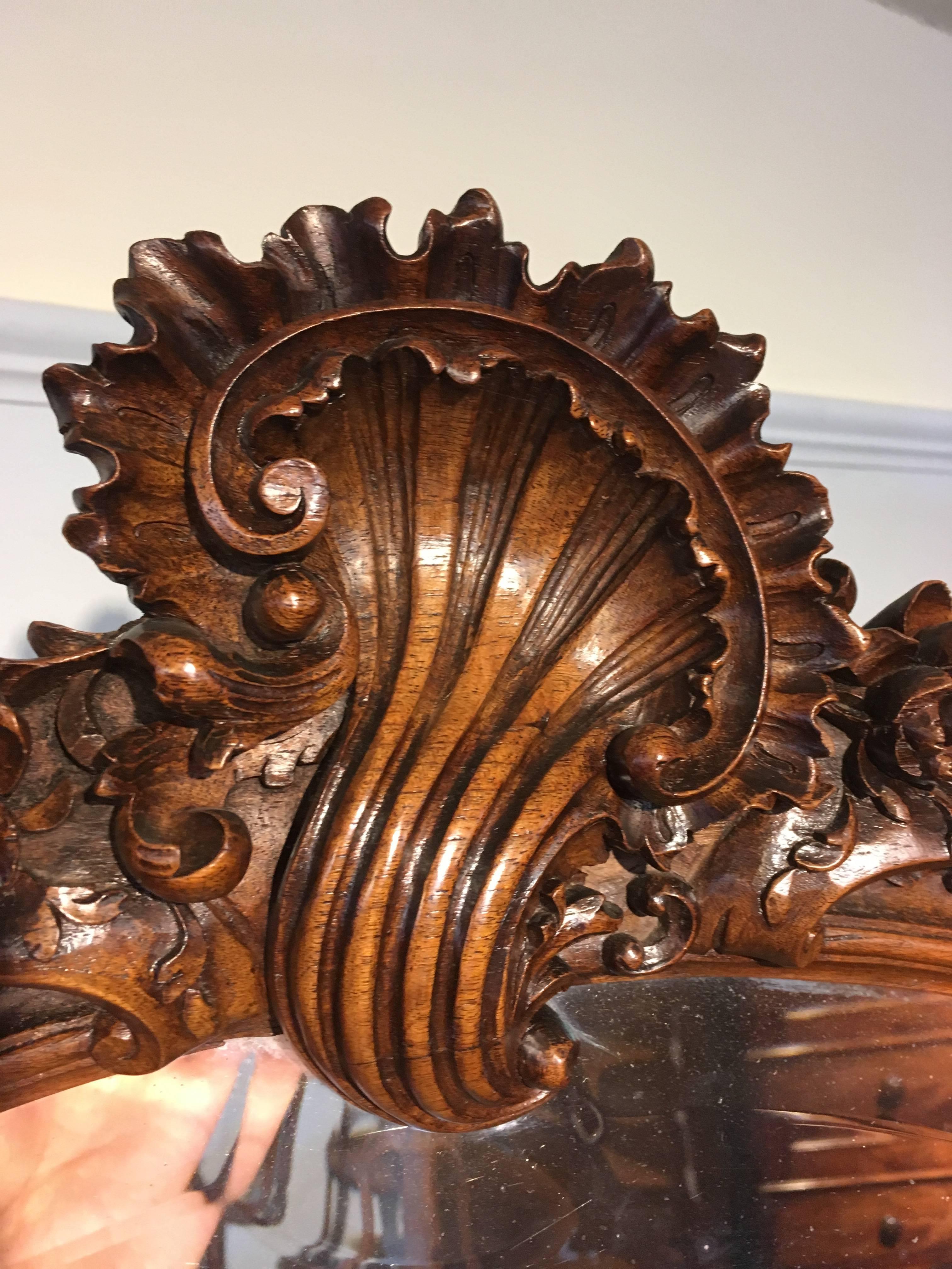 A fabulous late 19th century solid walnut cheval mirror, 

French, circa 1880 with original beveled mirror. (Some misting to the mirror) 

This piece has been through our workshops cleaned or wax polished lovely color or patina 

Measures: 82