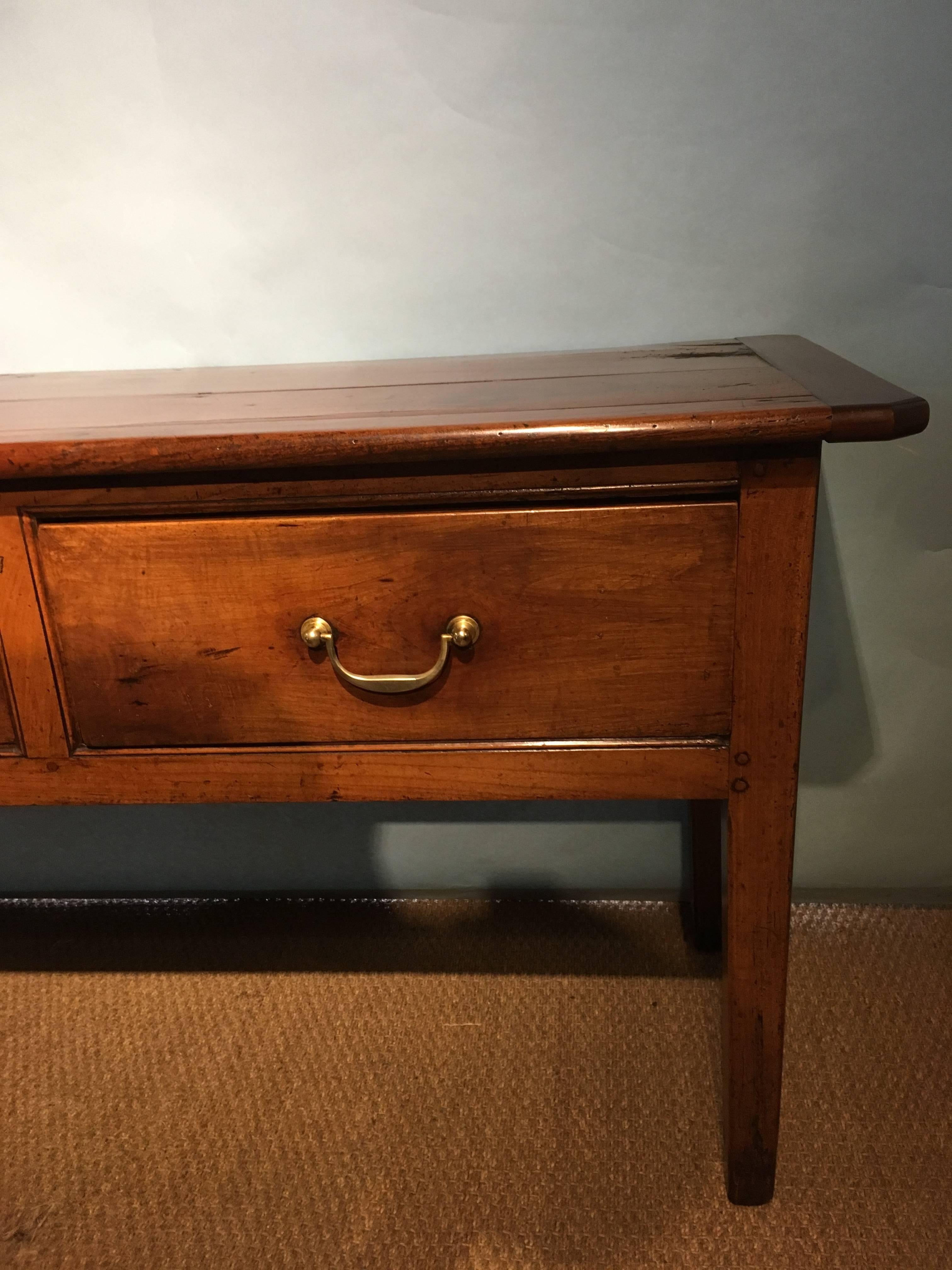 Good mid-19th century cherrywood dresser base / server. 

Measures: H 30 inches 77 cms 
W 70 inches 178 cms
D 20 inches 50 cms.