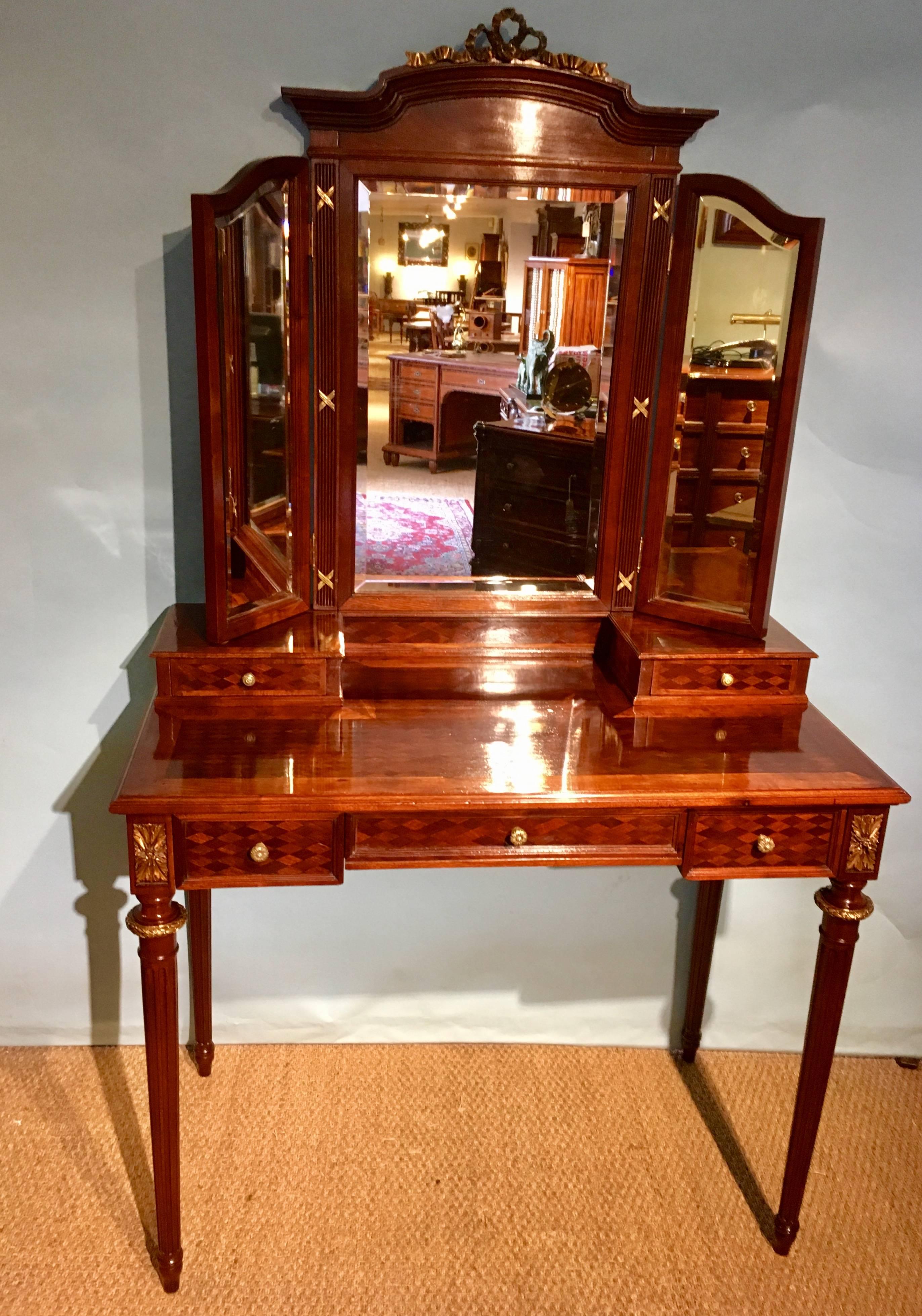 Very pretty late 19th century mahogany and ormolu-mounted dressing table 

French, circa 1890s.


Measures: H 68 inches, 173 cms 
W 39.5 inches or 100 cms 
D 21 inches or 53 cms.