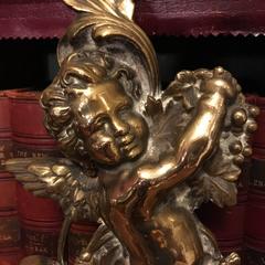 Two Early 20th Century Brass Cherub Door Stops