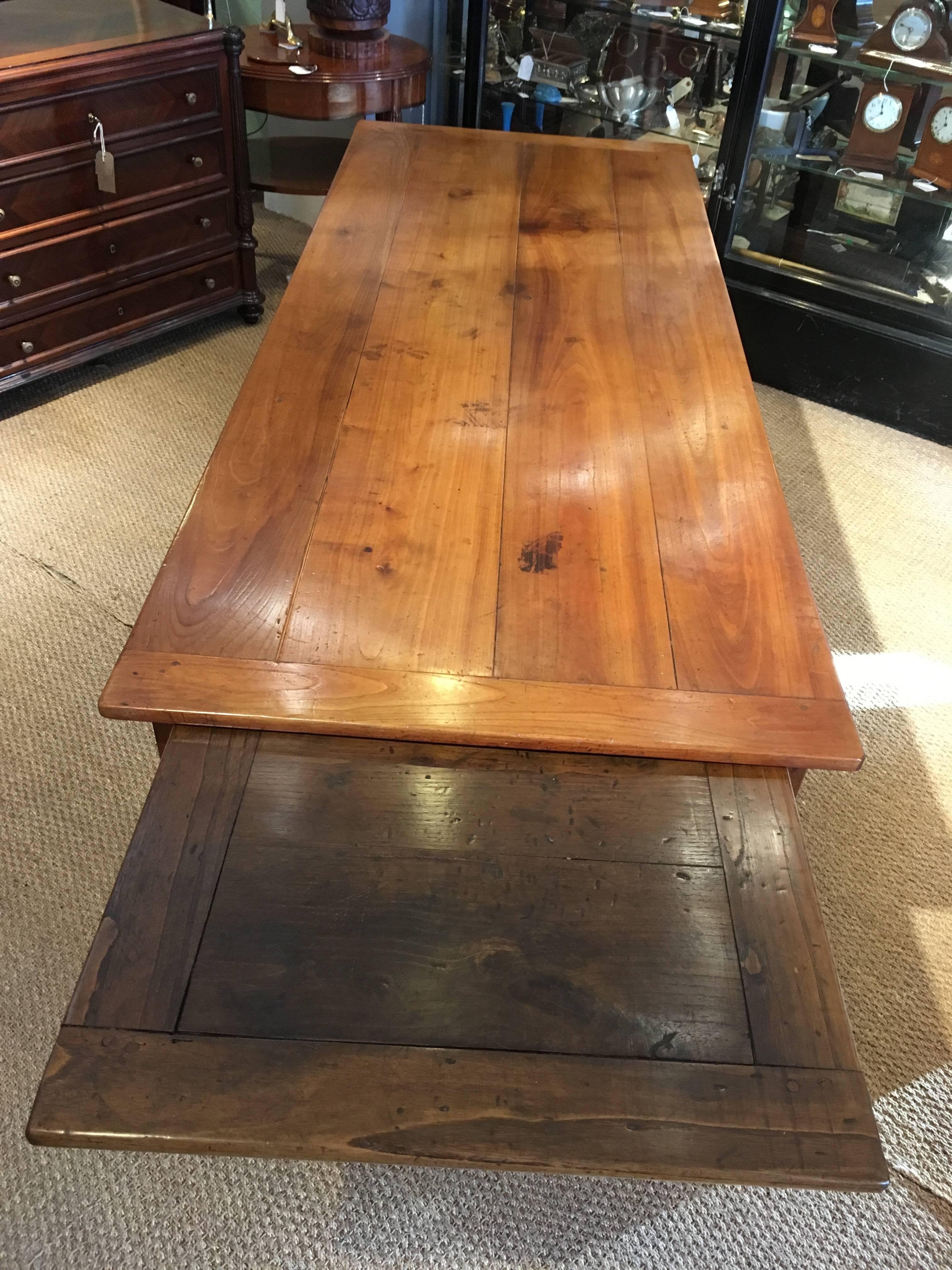 Gorgeous mid-19th century cherrywood farmhouse table 

Dating to around the 1850's having a wonderful original color and patina 

This table has been through our workshops, cleaned/waxed polished, all the joints are firm. Single drawer to one