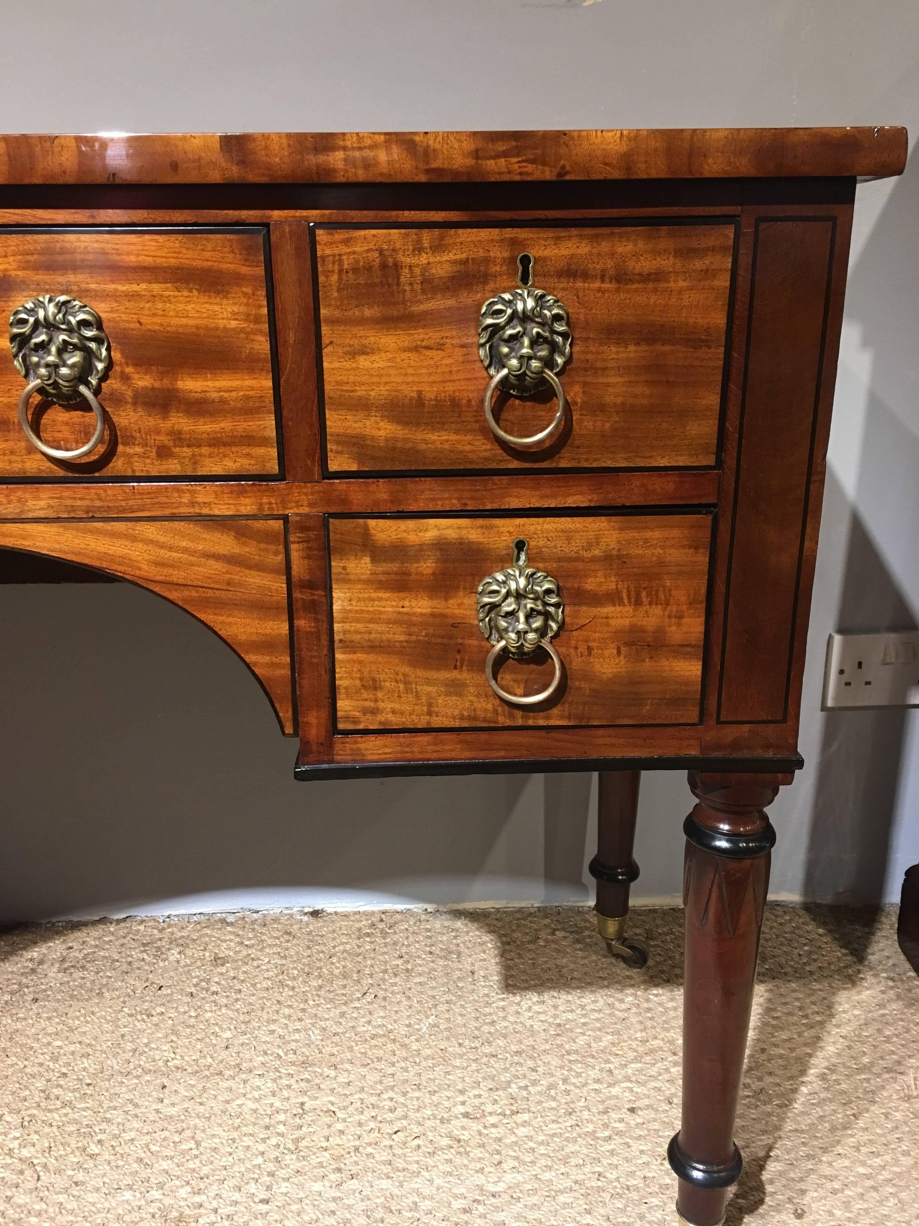 Early 19th century Georgian mahogany sideboard 

English with figured mahogany and ebony stringing detail, the handles are replacements but have been on this piece some time, circa 1820. 

We have put this piece through our workshops and it has