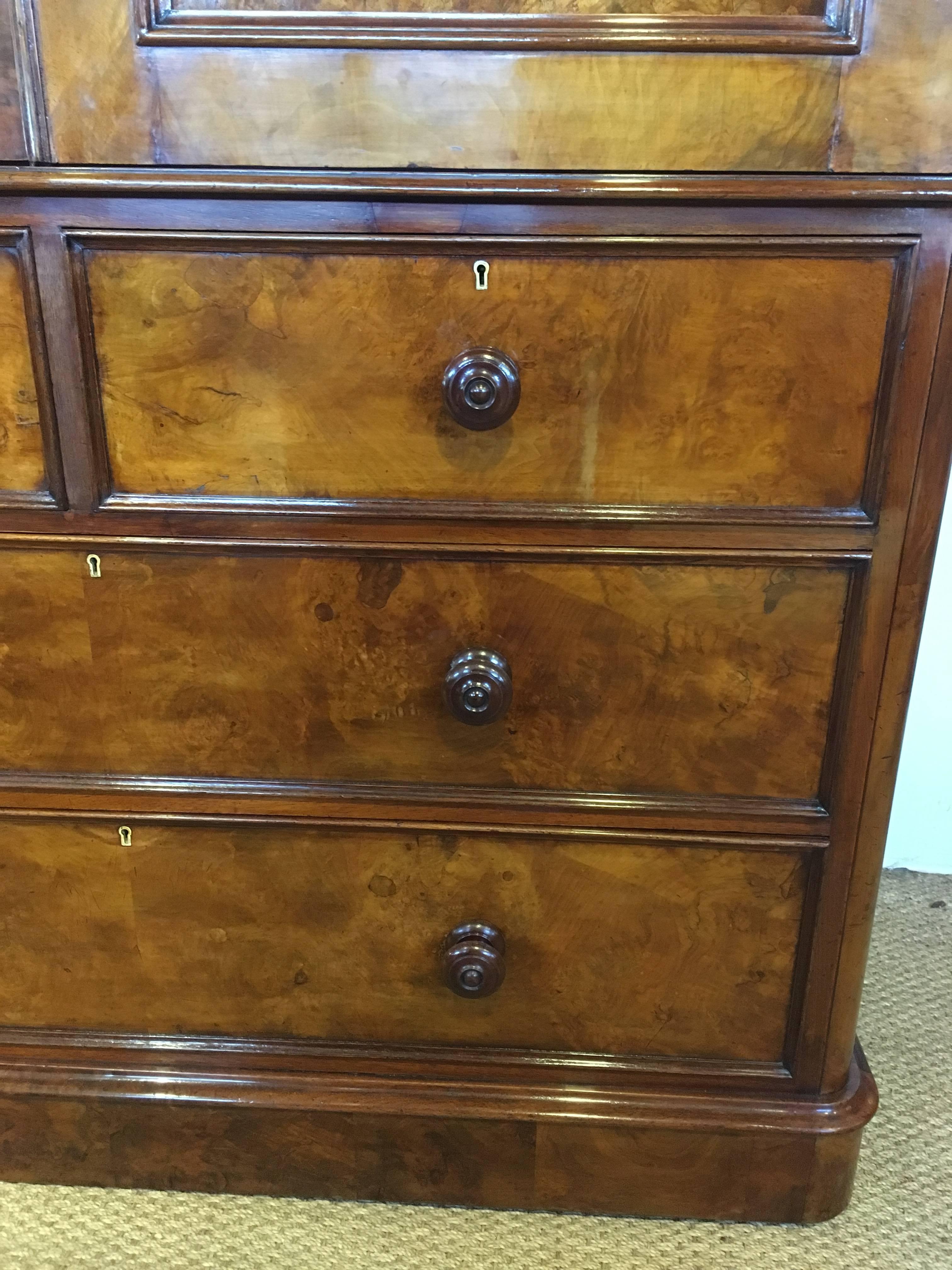 Wonderful mid-19th century figured walnut linen press 

English dating to around the 1850s , the whole piece veneered with fabulous figured walnut 

The top section has been very cleverly adapted at some stage of its life to half linen press and