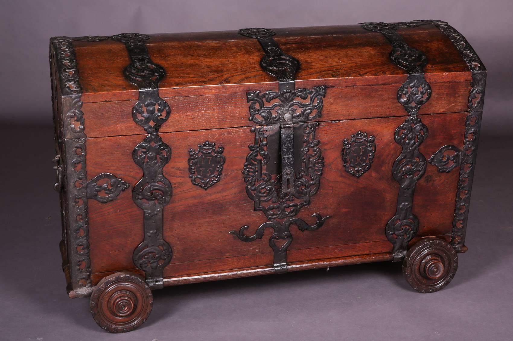 Solid Maron oak with rich wrought iron fittings decorated standing on four wheels.

(V-122).