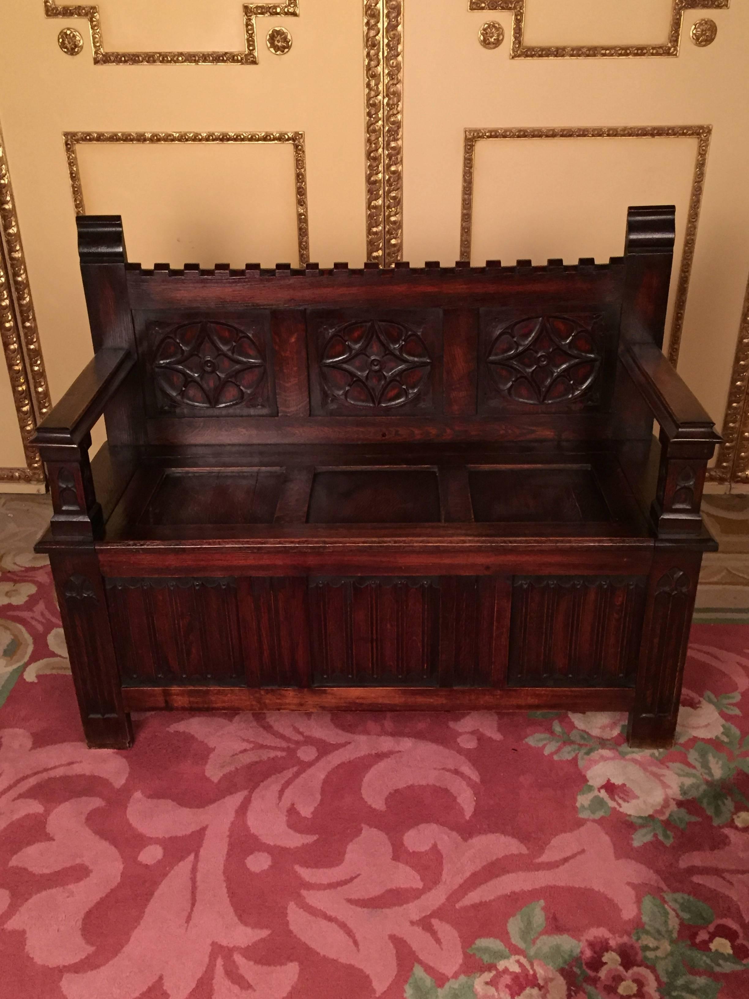 Solid dark oak with Gothic carvings. Foldable seat.
The bench offers a large storage space. Extremely high-quality carving.
Very decorative and impressive
High backrest with armrests.


(B-141)