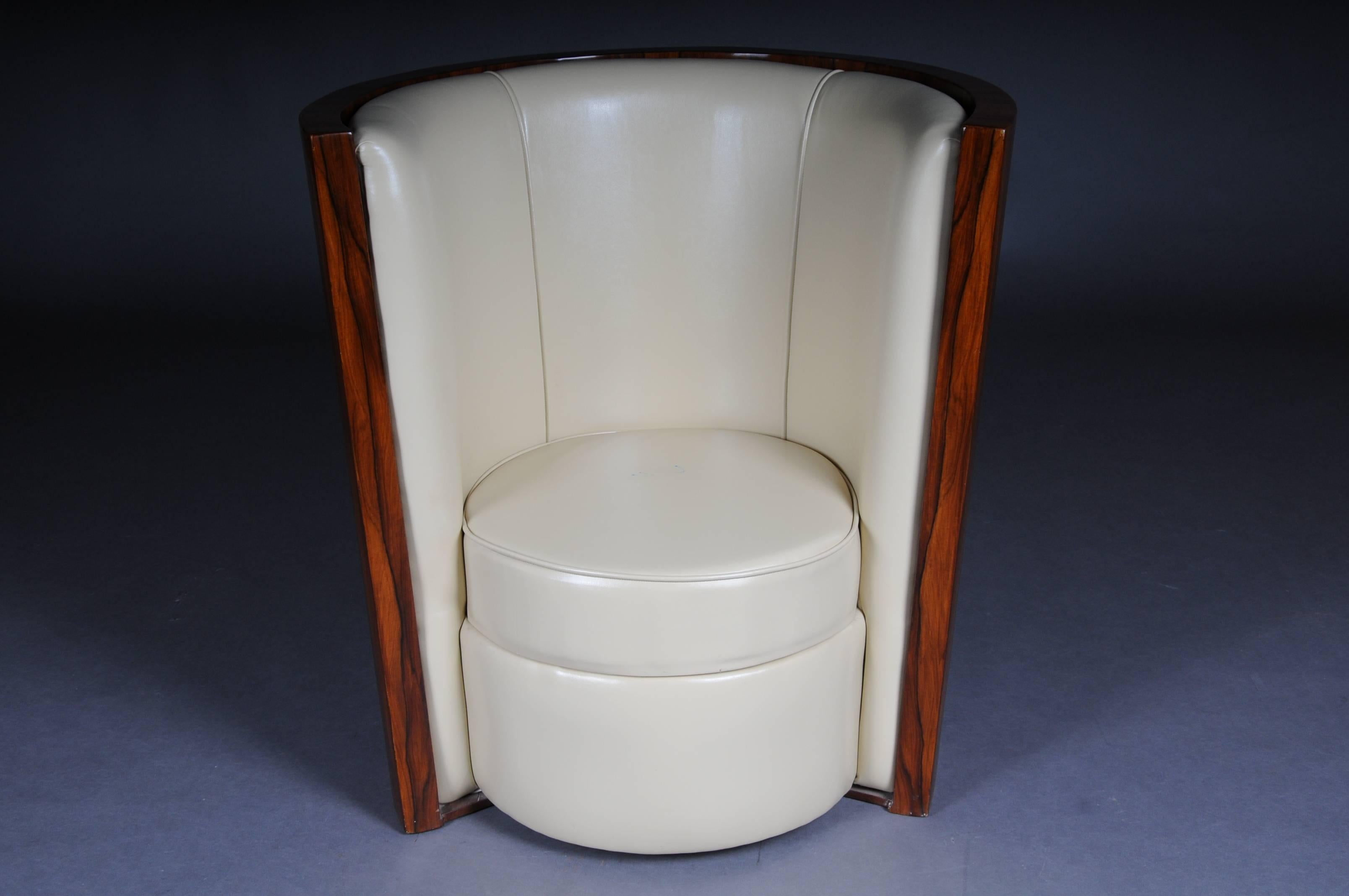 Exotic rosewood on solid conifers. Conical shaped body with high closed backrest. Externally decorated with a decorative grained veneer. The backrest and seat are upholstered with a creamy white leather imitation. High quality original Classic