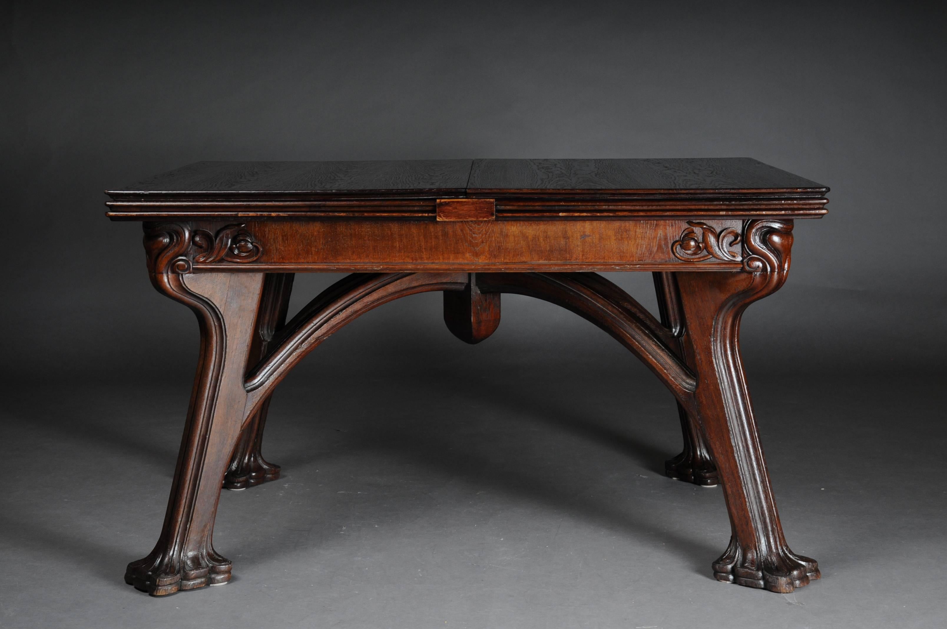 Probably Eugene Gaillard!
Solid oak hand-carved. Rectangular body on four straight legs. Table with impressive Art Nouveau elements. The table is extendable. This table is unique and an eyecatcher

Extended state:
Dimensions in cm: Length 386