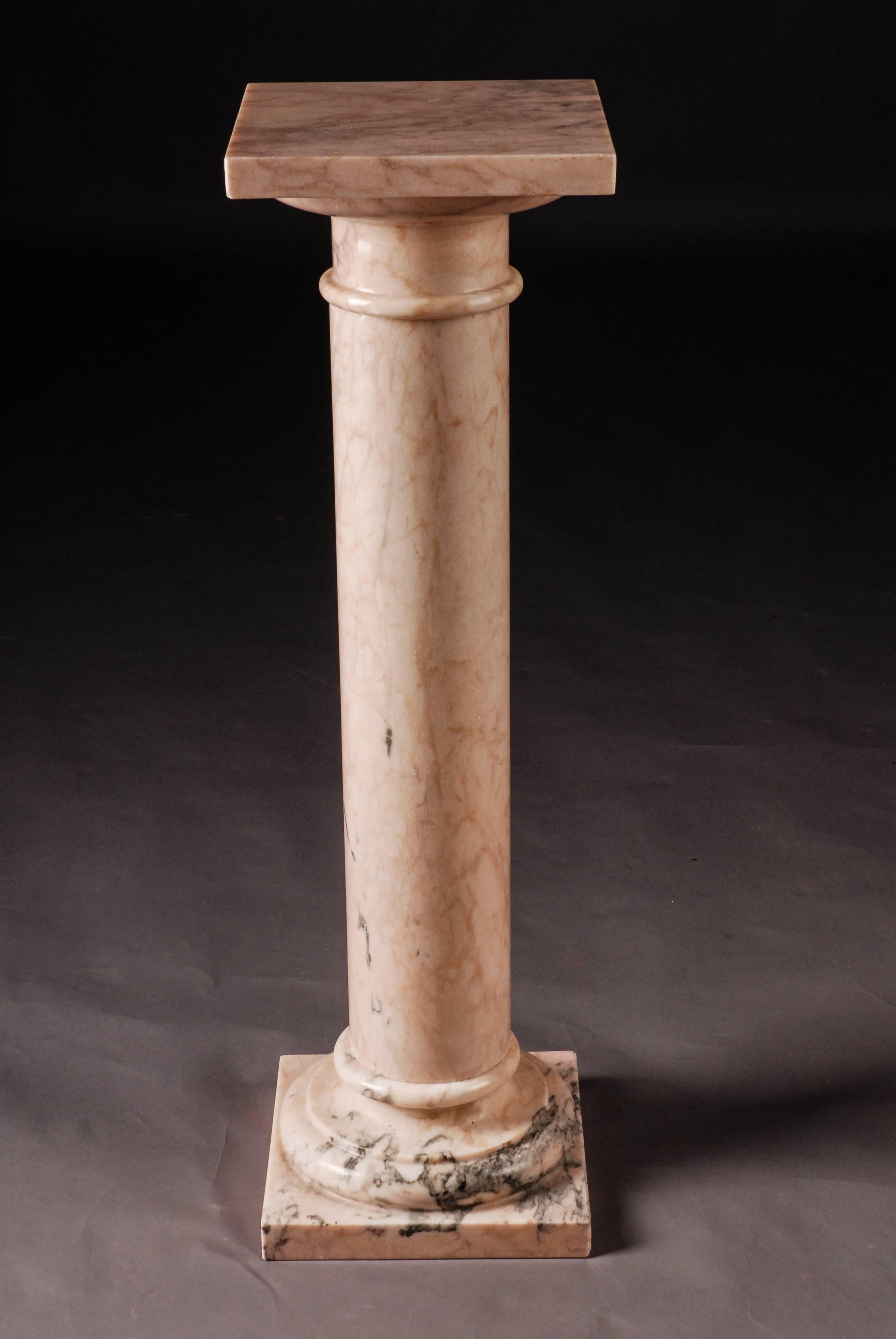 Bright marbled rosé. Square plinth with balustrade-shaped column base. Wide, stepped square top plate. The column consists of several parts.

(K-28).
