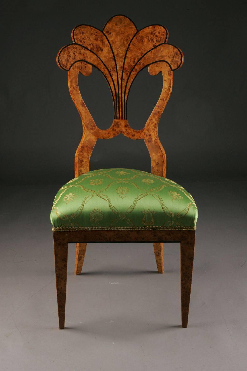 Vienna Biedermeier chair in form of a fan after J. Danhauser, 1805-1845.
Solid Beechwood with maple root veneer. Filament intarsia and slightly curved, fan-formed backrest.

(C-Sam-16).