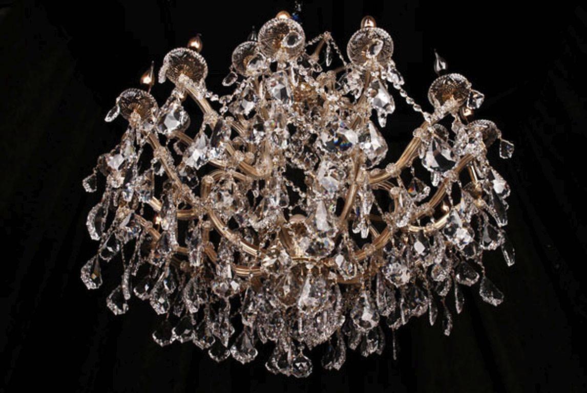 Monumental Maria Theresia ceiling chandelier in Baroque style.
Baluster- formed with broken-through body. Twenty five flamed, rich hangings from various faceted crystal.

(F-Asf-10).