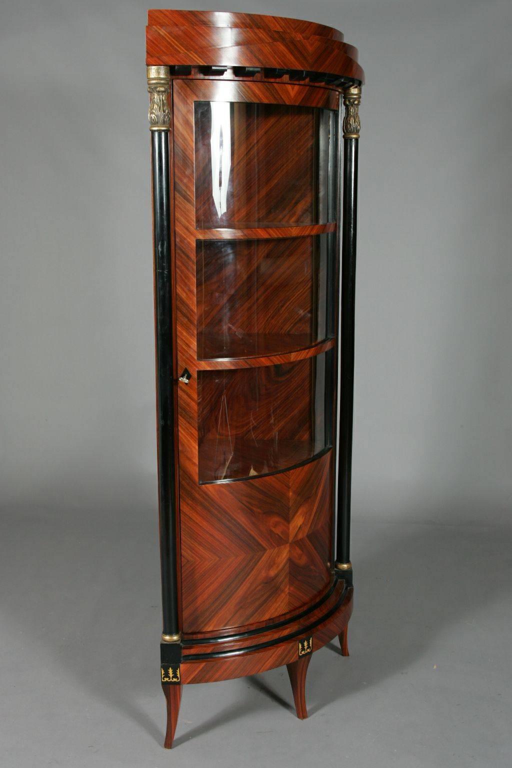 Tulip mirrored- veneer on solid Pinewood. Partially ebonized. Cambered one- doored corpus flanked by full columns.

(O-Sam-4).