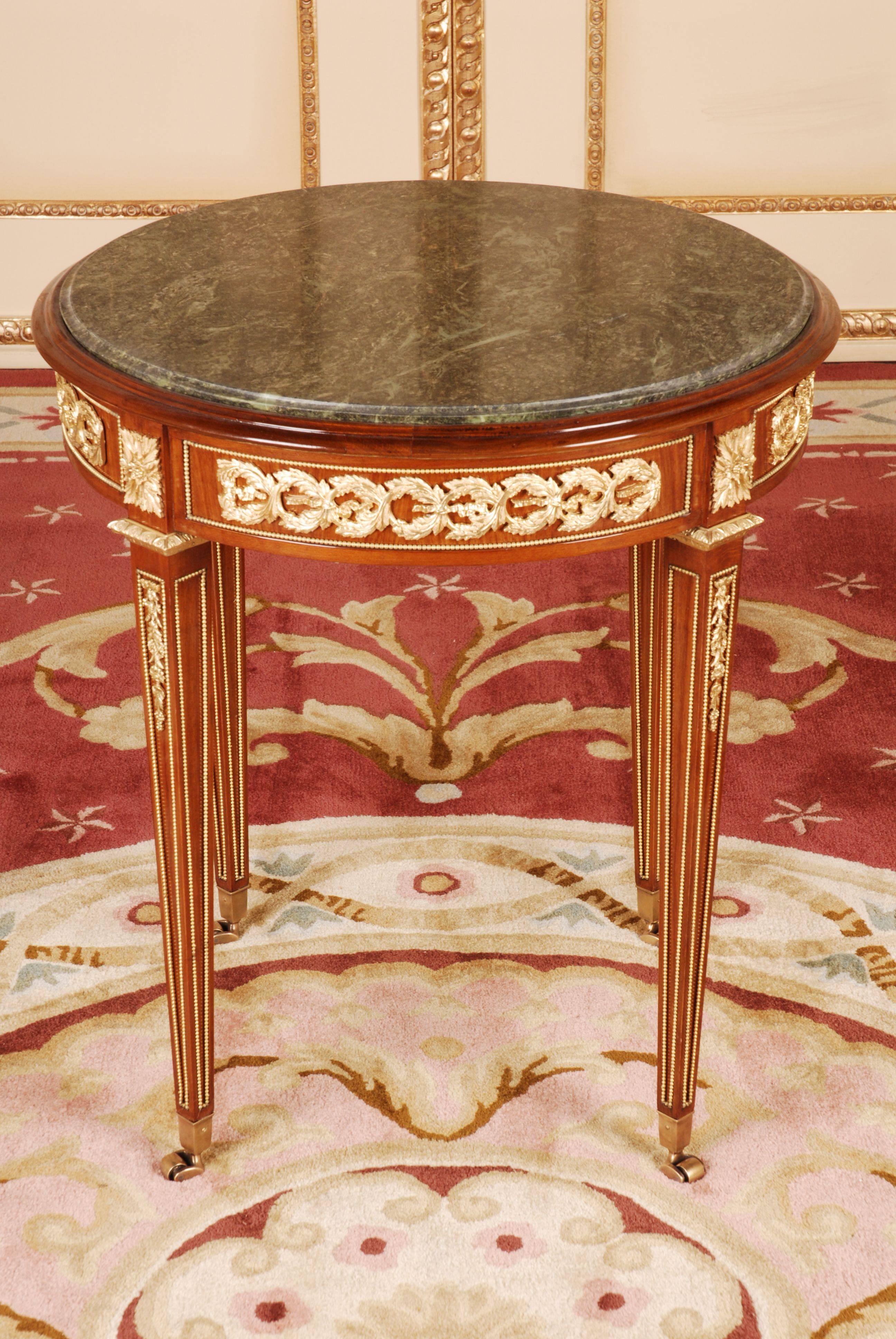 20th Century Louis XVI Style with Round Marble Platter French Table
Solid beechwood with partial veneer and finely engraved bronze fixtures.

(G-Sam-102) .