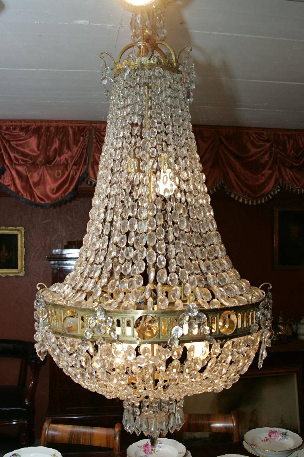 Monumental antique basket chandelier Biedermeier style, circa 1890-1900
Finely chiselled bronze. Basket-shaped body made of hand-wired bead cords. In the course of leaf rosette and final pine knob. Connected by broad, ornamental and perforated