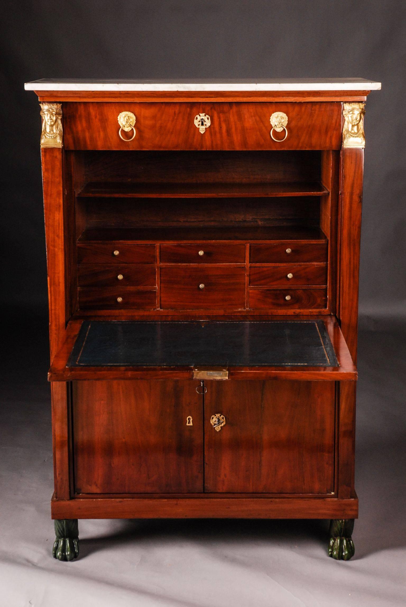 French Empire secretary 1815 from Countess of Schulenburg-Wolfsburg.
High-quality Cuba mahogany on solid oak. Fire gilded, finely chiselled fittings. Central lock with a special key. Architecturally arranged front. High-right body on green pawns.