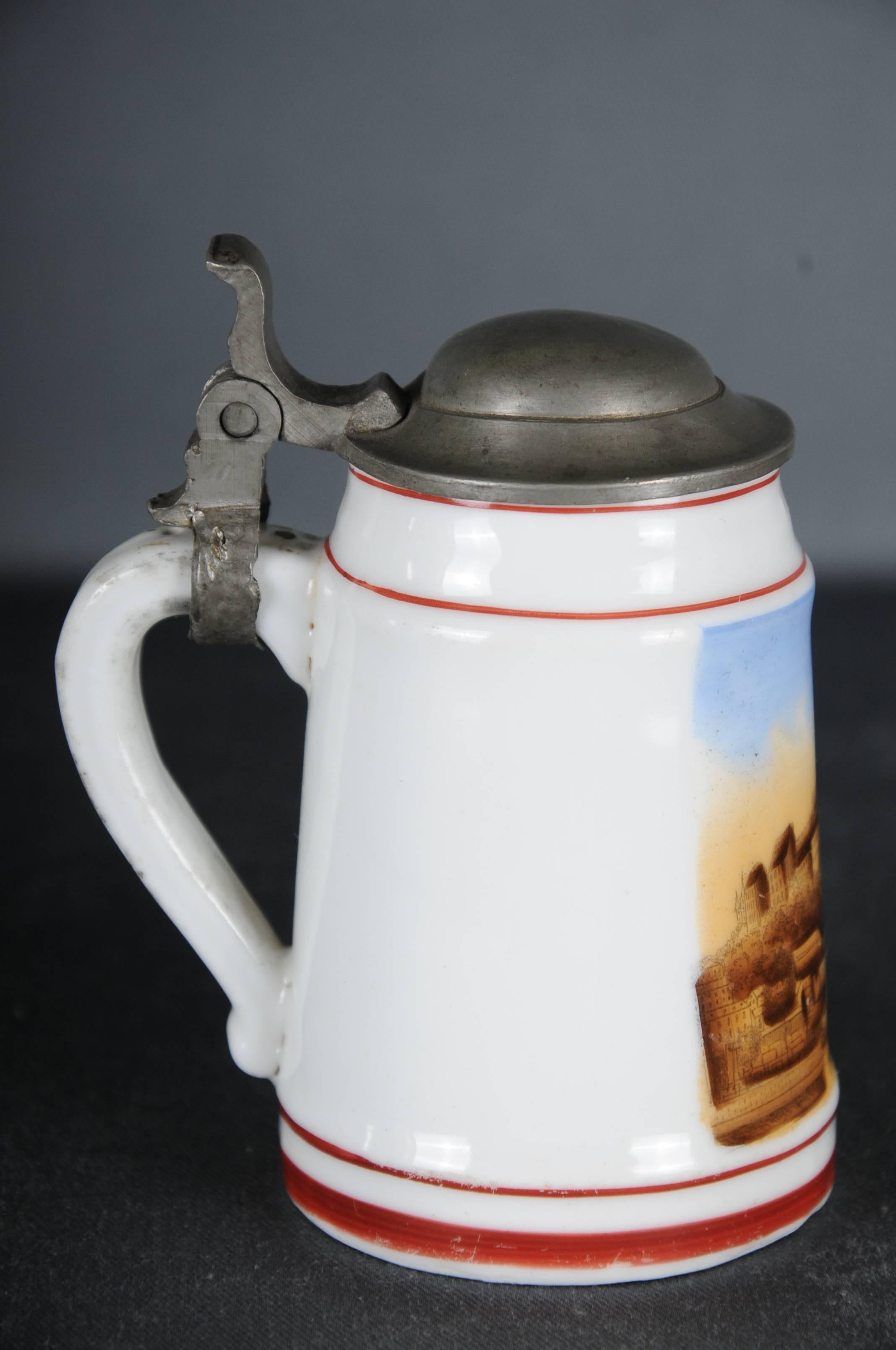 Miniature beer jug with pewter lid. Old view of Meissen.
Tin mounting loose and would have to be fixed.

Please refer to the detailed pictures for details.