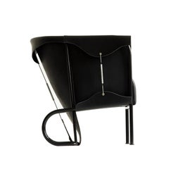 Fauteuil club anglais inspiré de la sellerie et de la haute couture en cuir