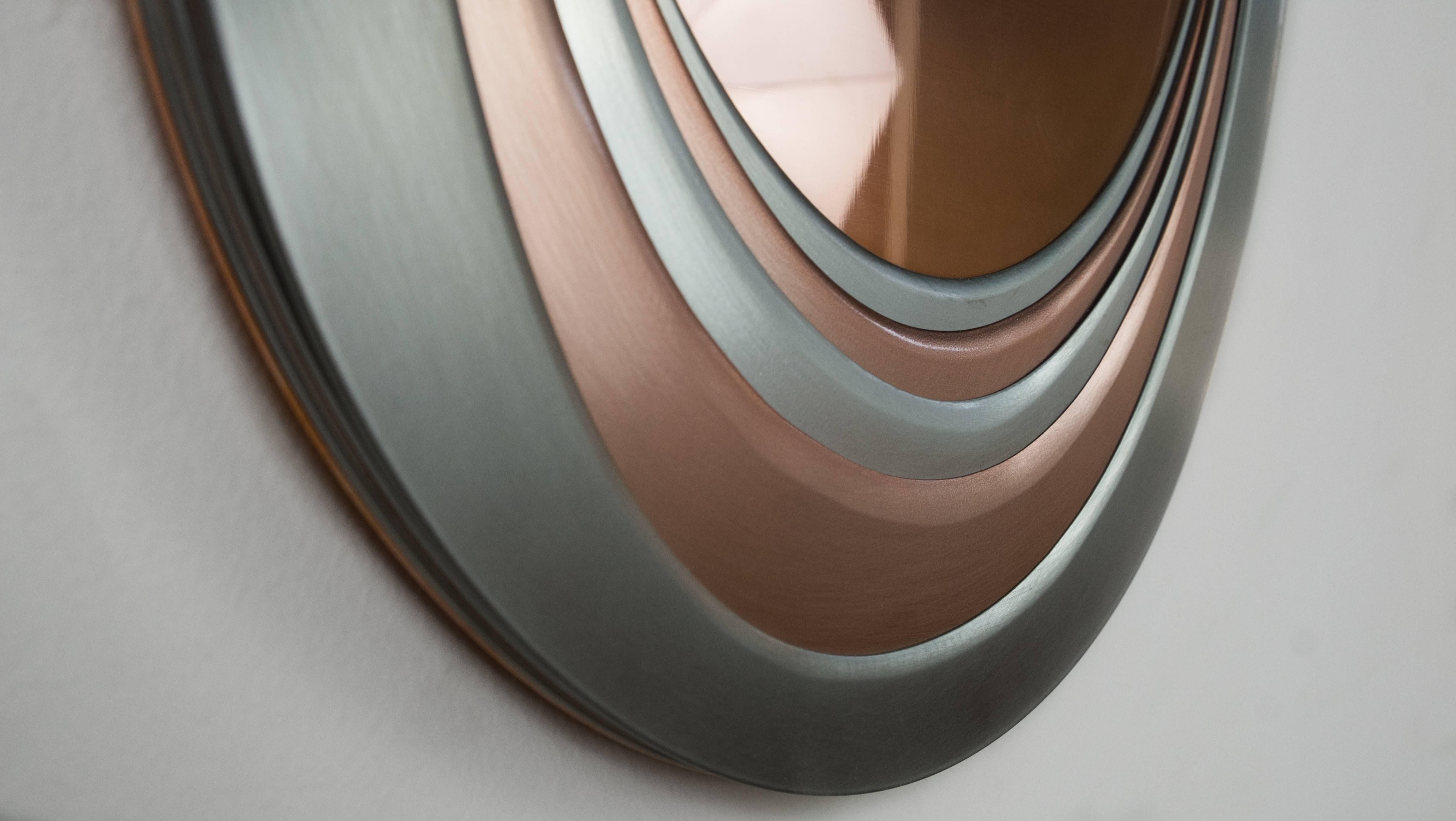 Mirrored are reflective objects constructed out of different types of metal layered together to create an organic feel.
Highly polished steel or copper gives high reflectivity to the last layer, creating a mirror effect.

Materials: Copper,