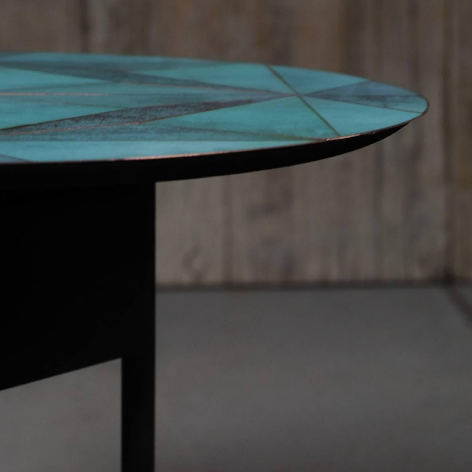 The use of inlaid metal is a homage to Paris of the 1920s and to Art Deco design of Emile Ruhlmann and Jean Dunand, who were main advocated of this style; essential forms - minimal and yet so refined, a timeless elegance – a clear reference to the