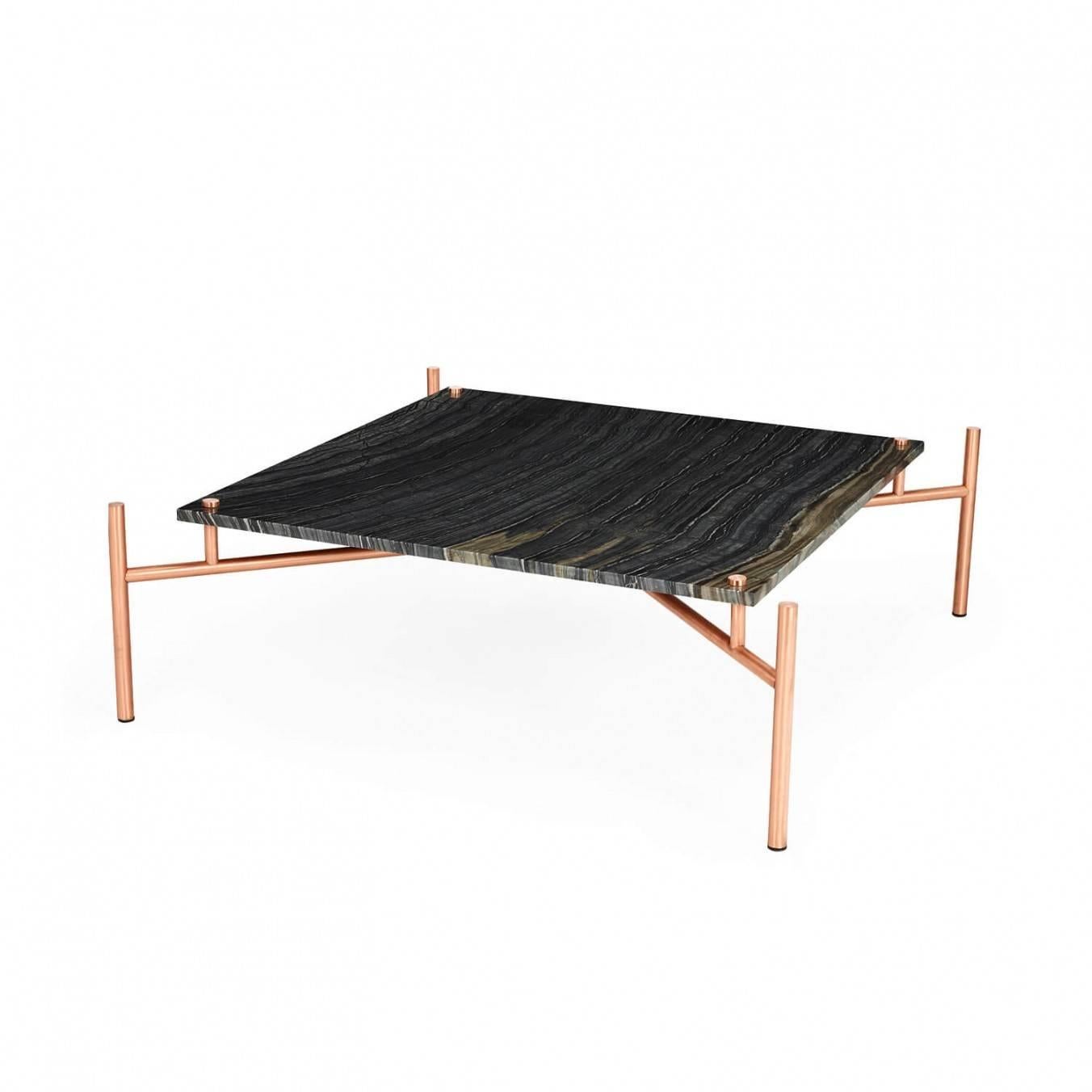 Marble coffee table with copper legs.