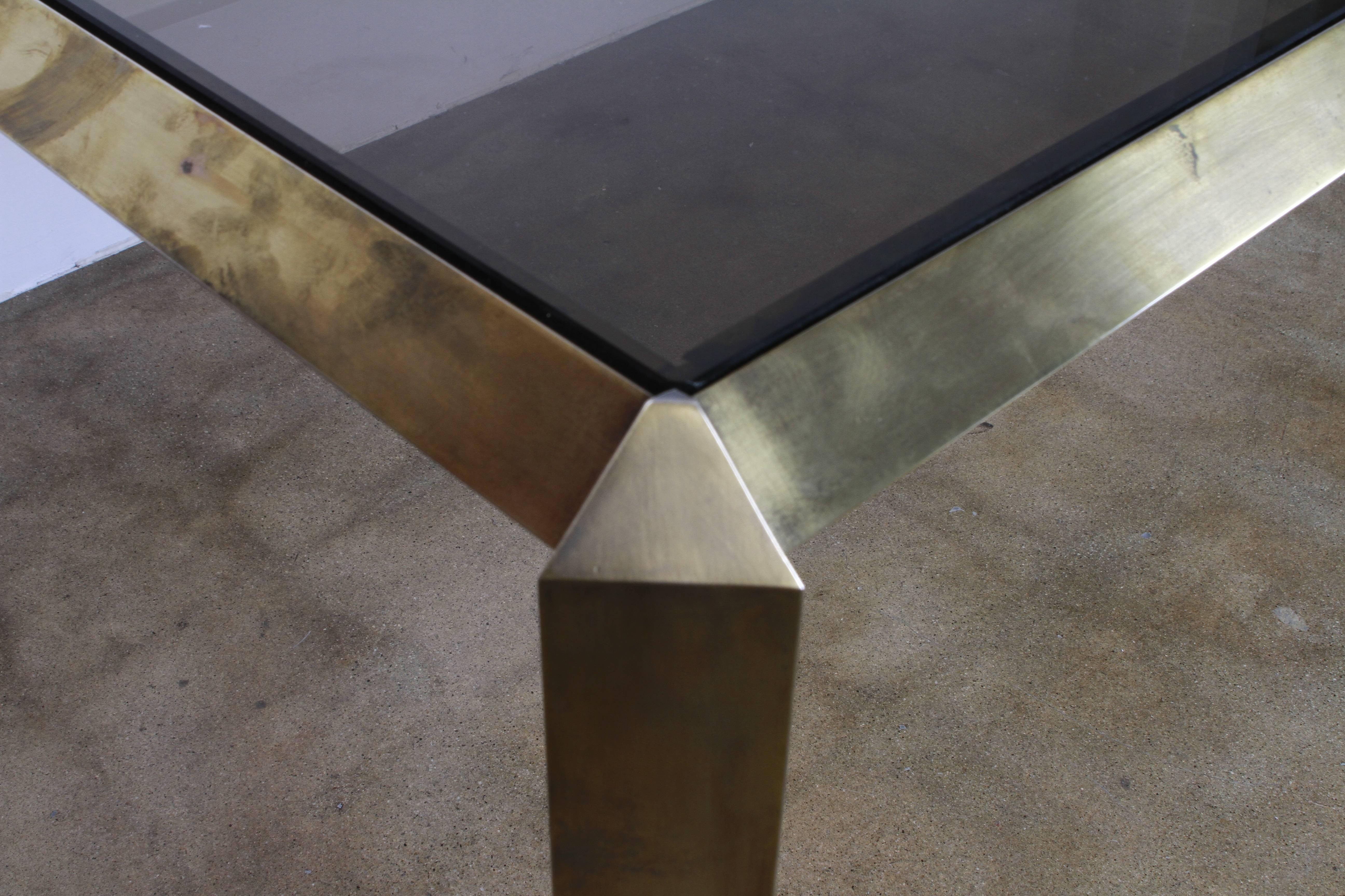 Belgo brass chromed dining table with smoked glass top
Origin: Belgium
Period: 1970s
Materials: Chromed brass, smoked glass
Condition: Wear consistent with age and use.
     