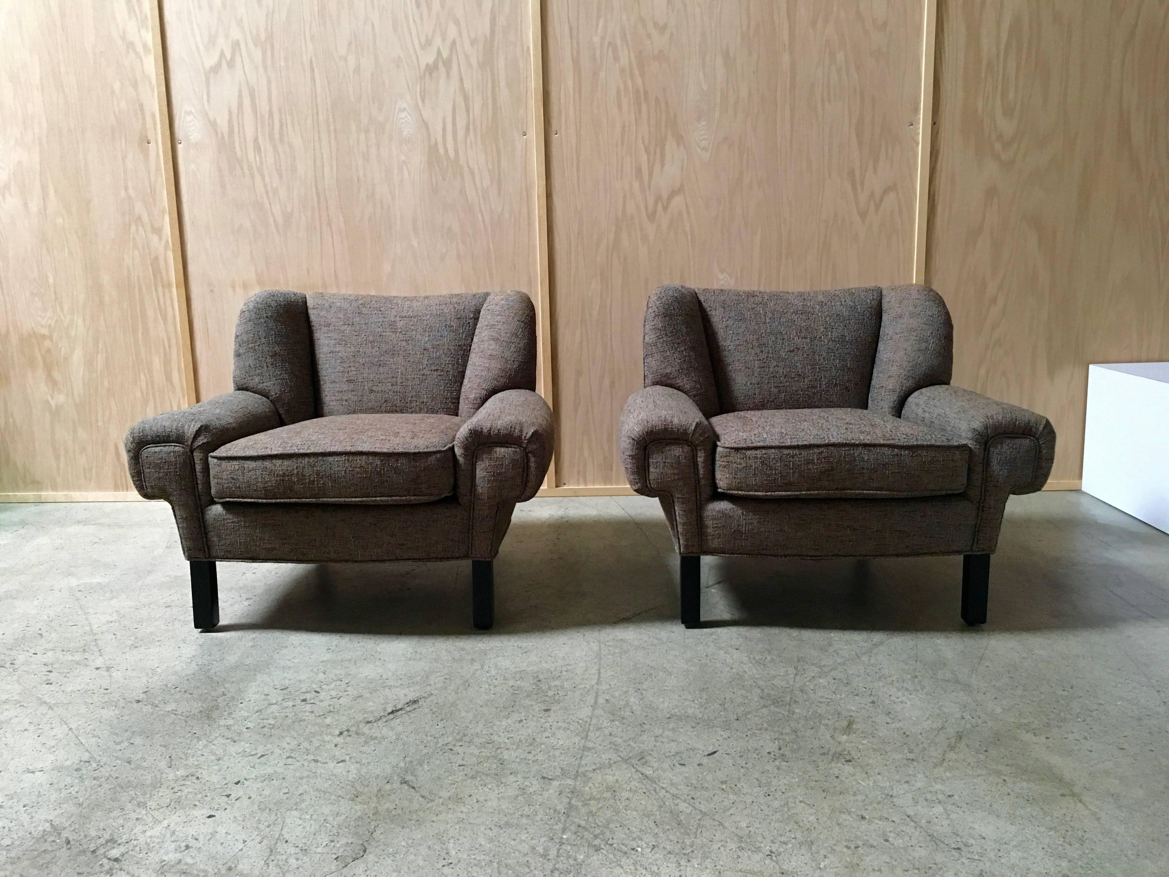 Pair of Paul Laszlo lounge chairs.