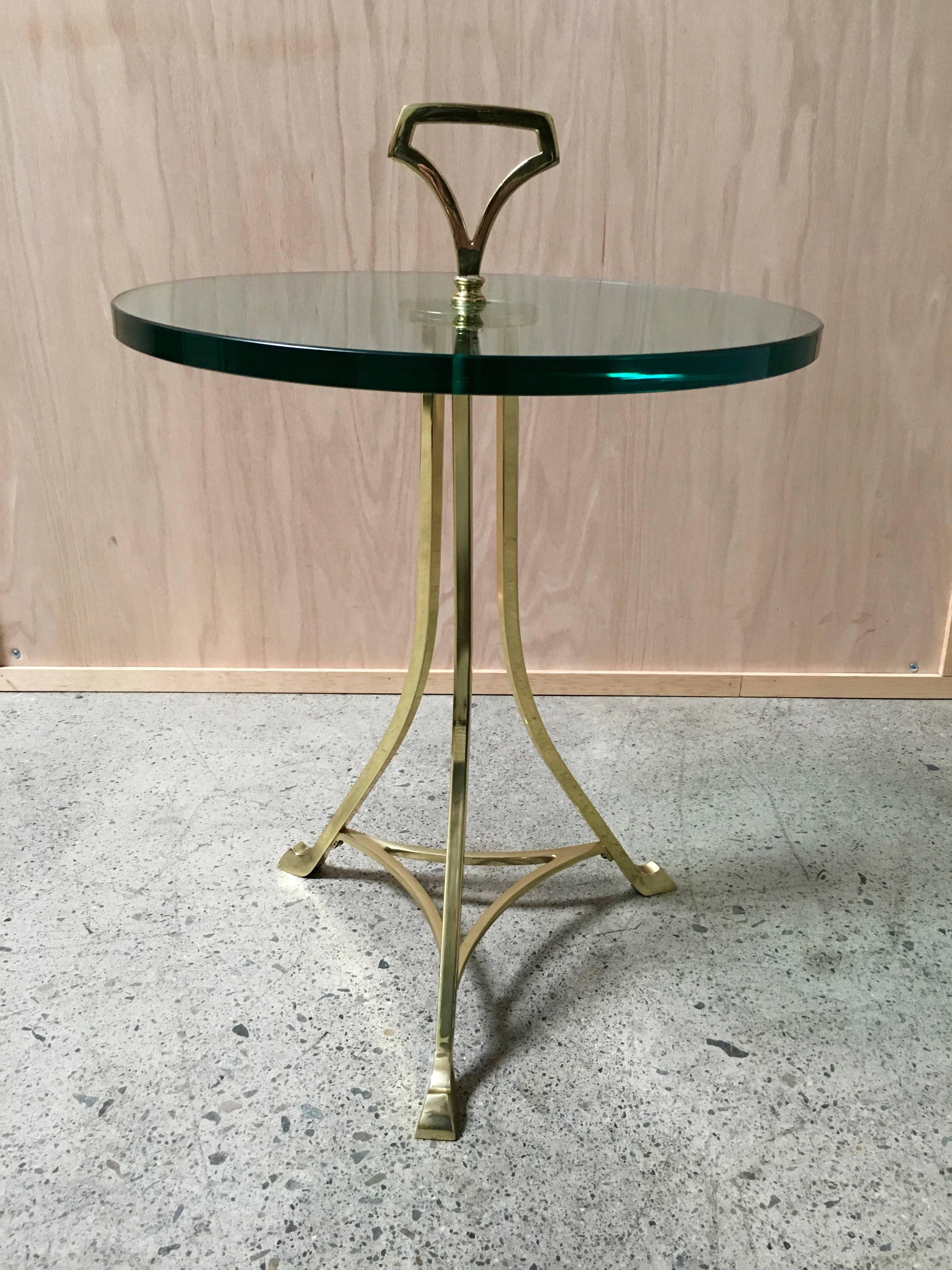 Mid-Century brass and glass end table.