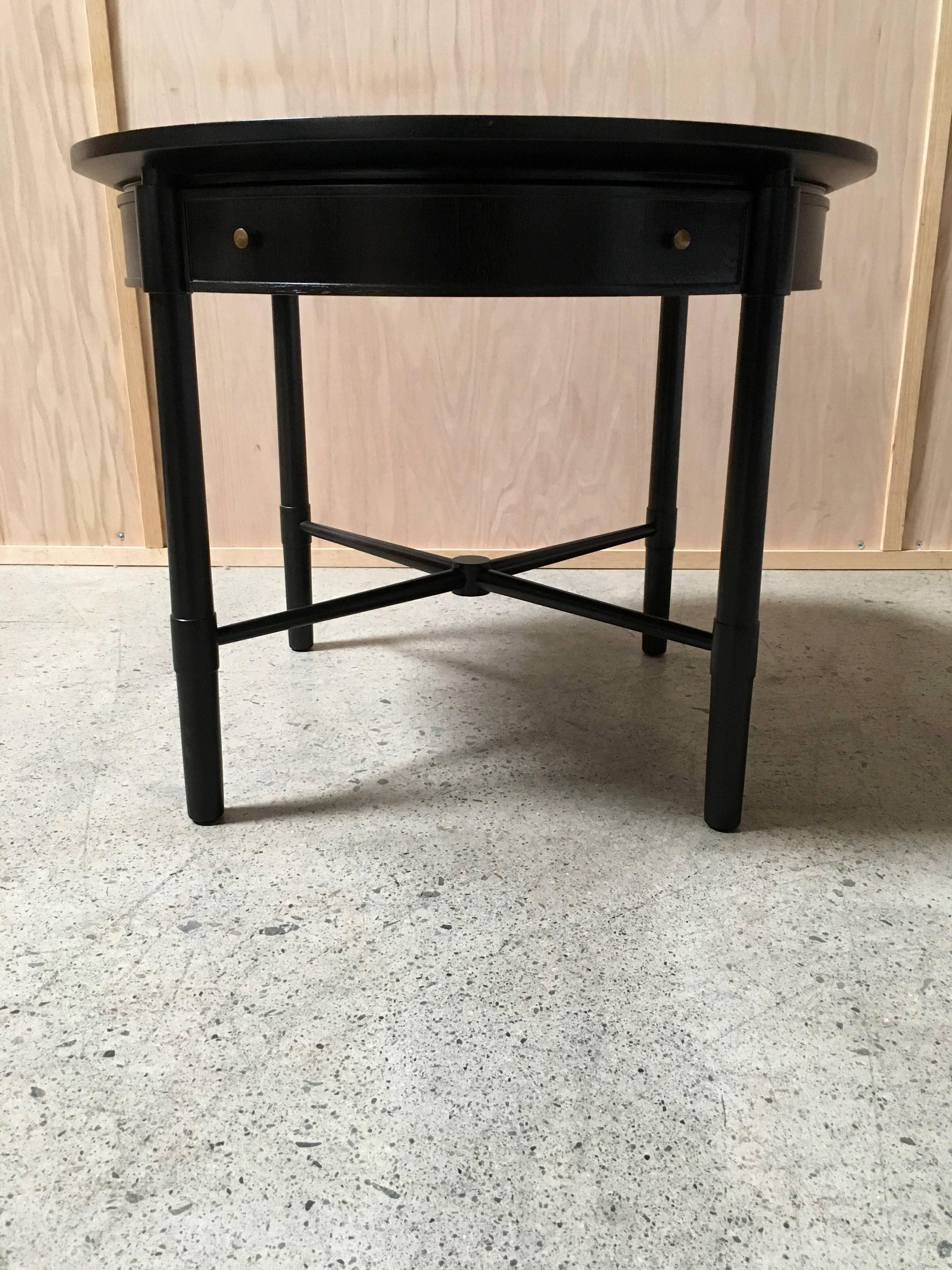 Ebonized side table by Johnson Furniture Company with X-base.