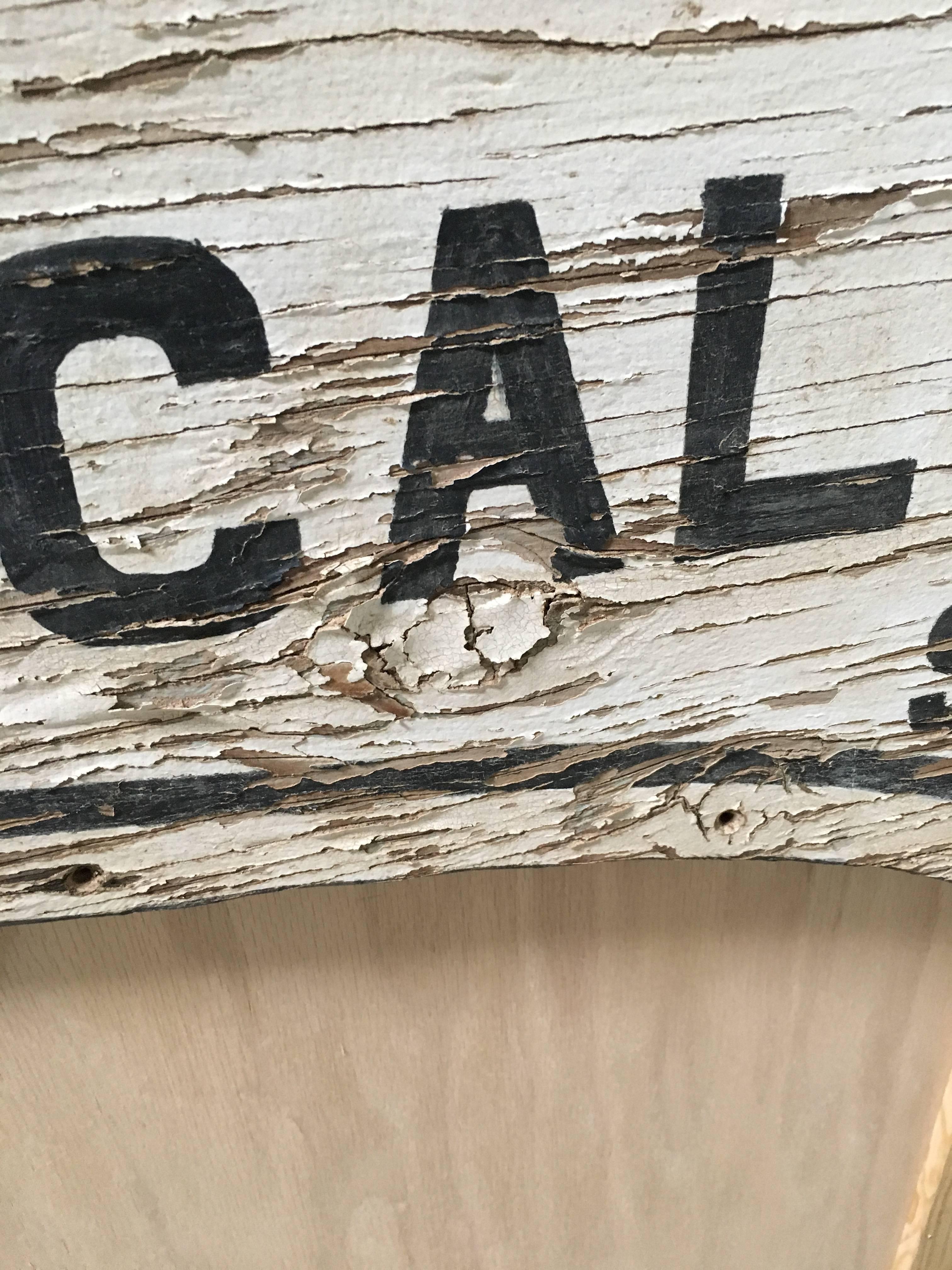 Hand-painted Folk Art Route 66 sign on plywood.