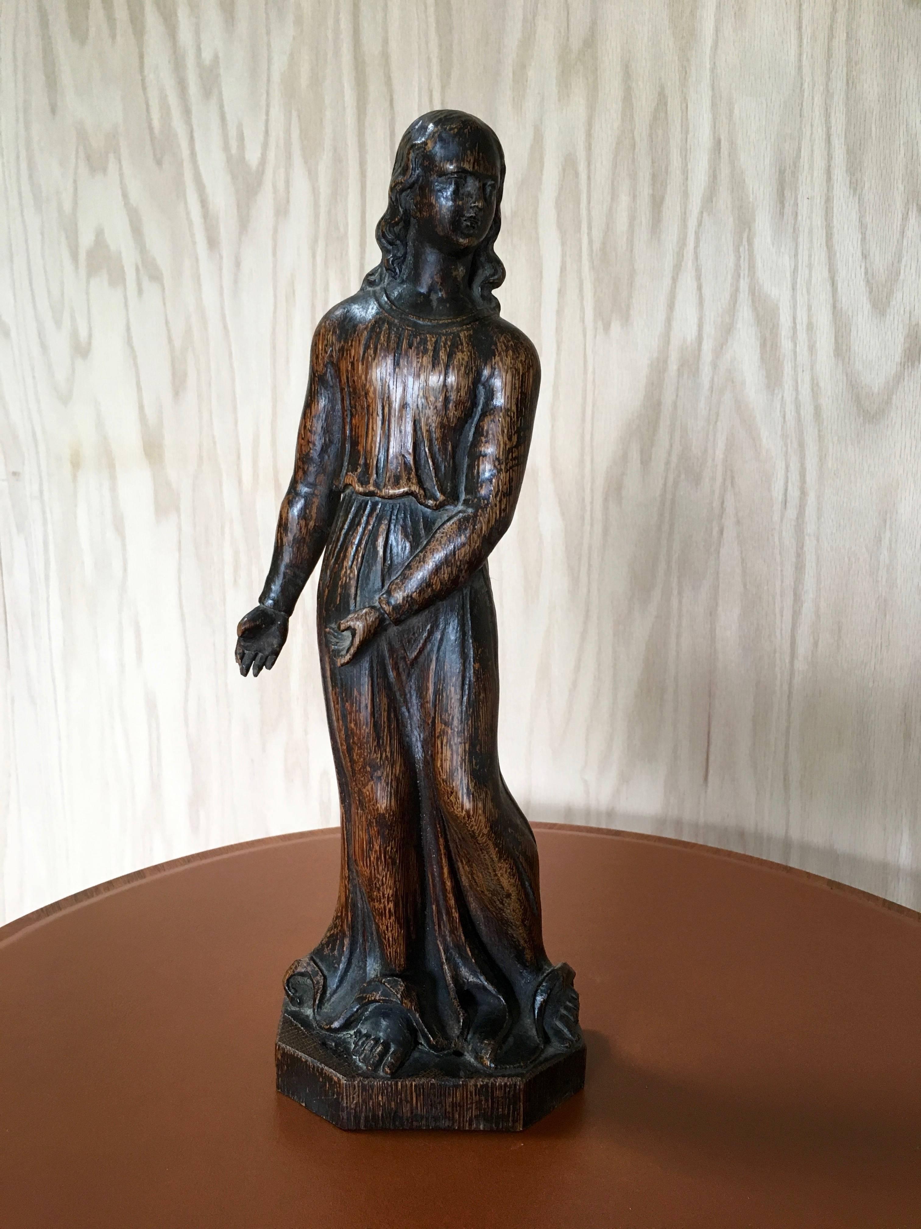 19th century hand-carved statue of a woman sculpture.