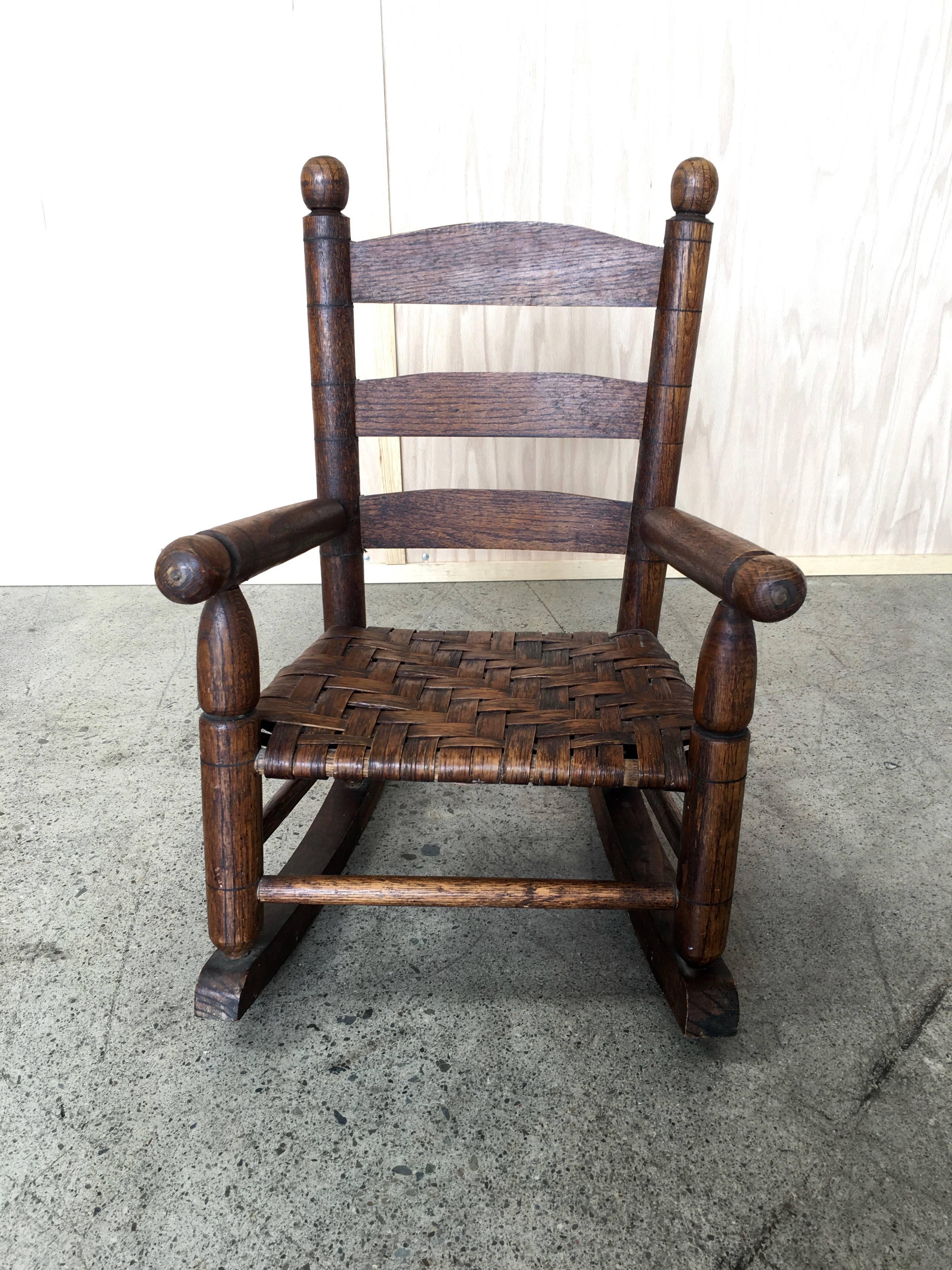 Basket weave Country childs rocking chair.