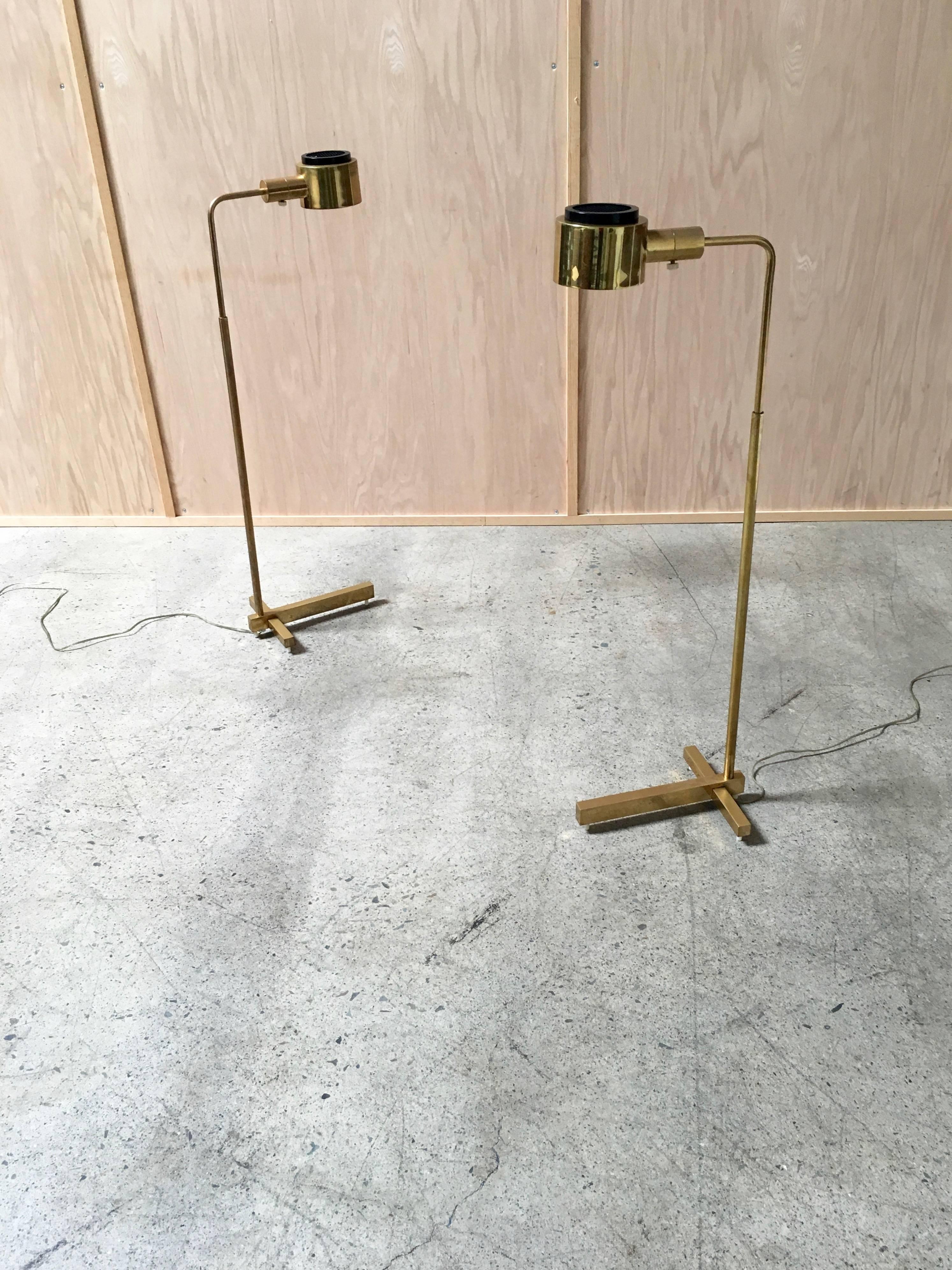 Casella brass adjustable floor lamp.