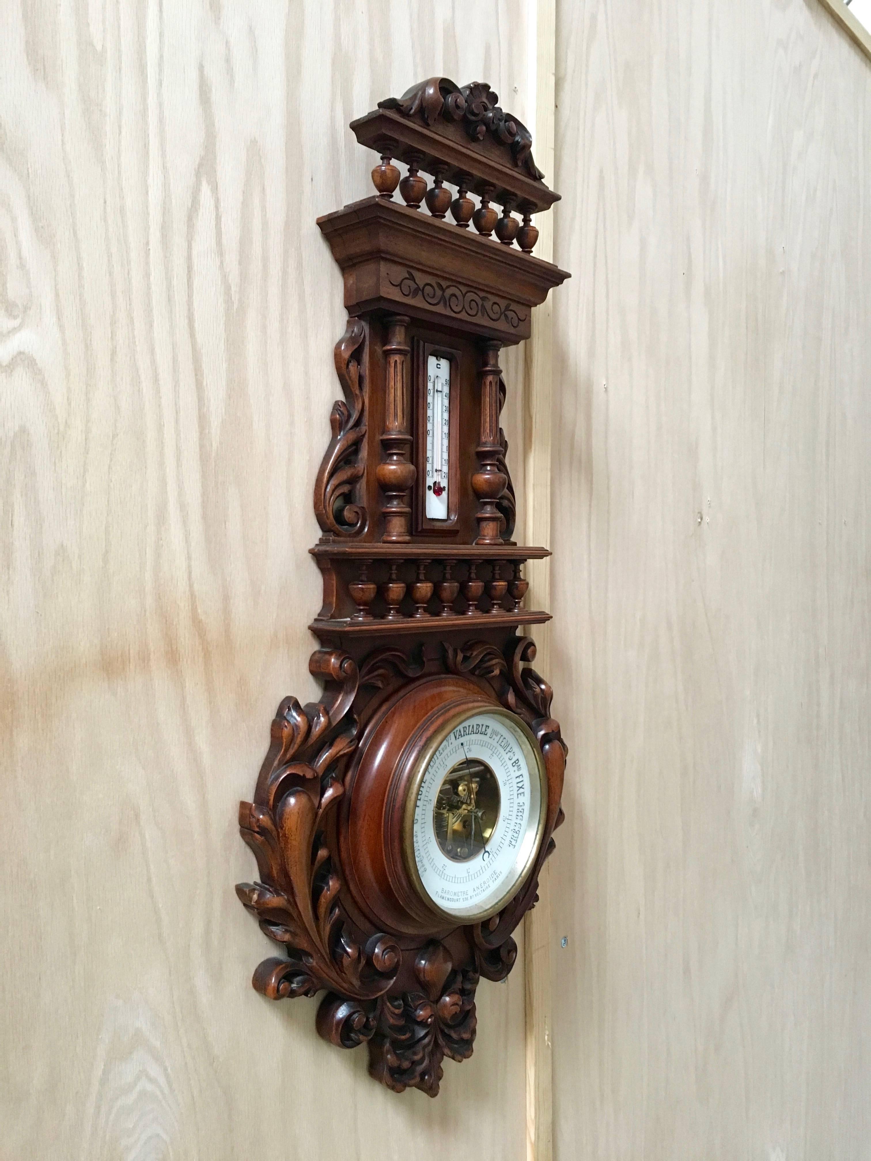 Antique 19th century carved walnut aneroide barometer with thermometer in centigrade.