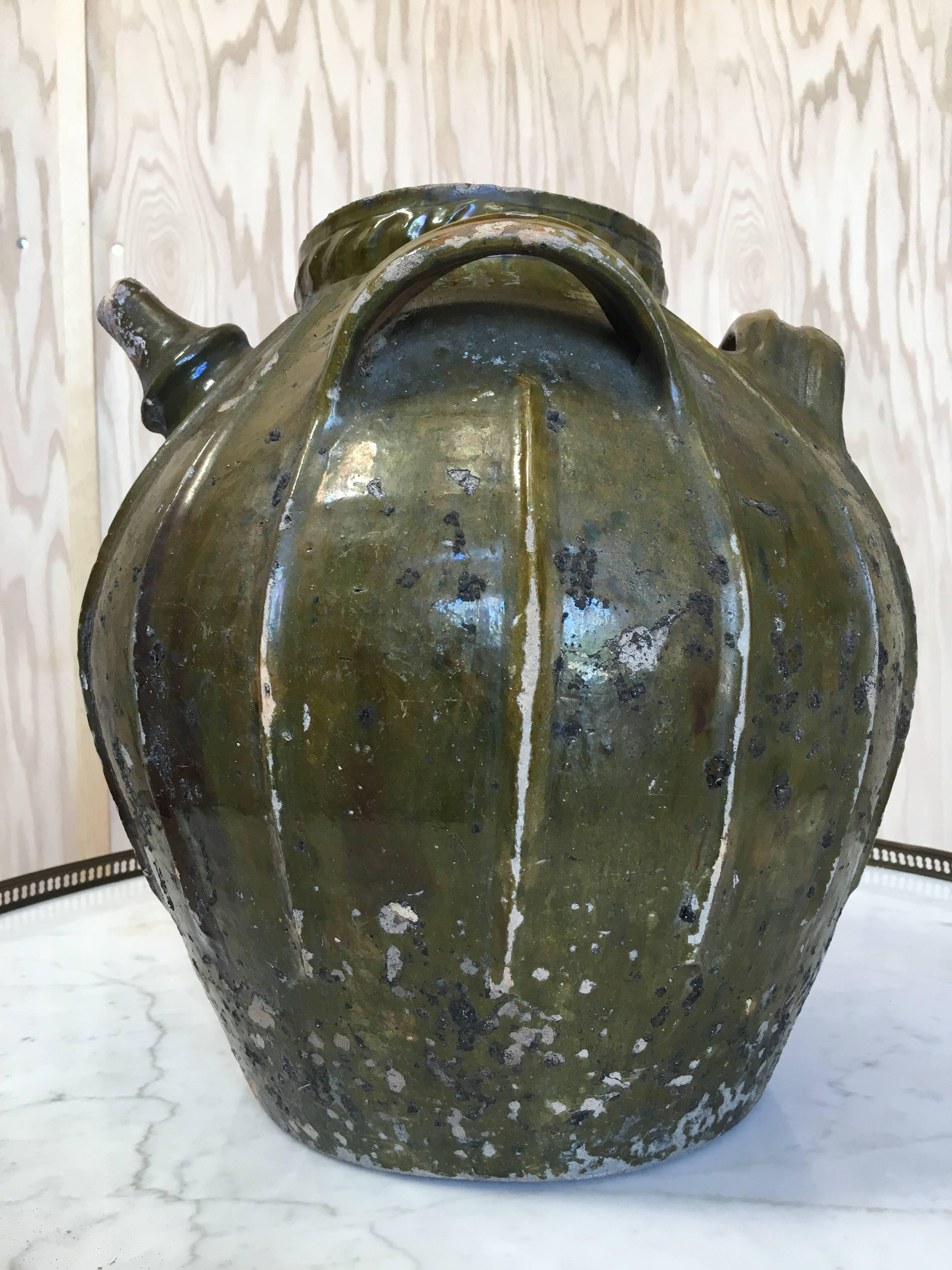 Antique 19th century terracotta oil jug.