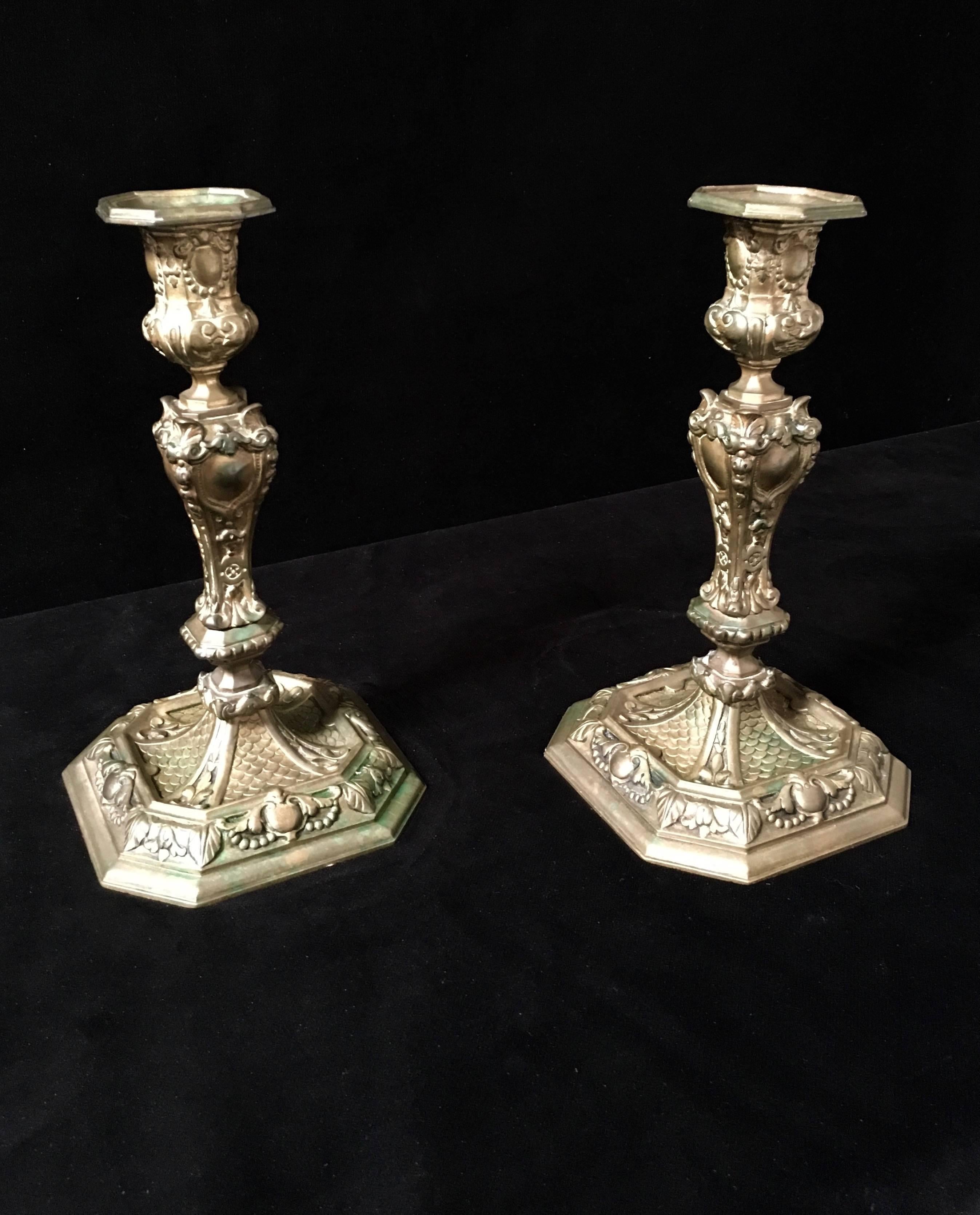 19th century antique Rococo style brass candle sticks with nice patina.