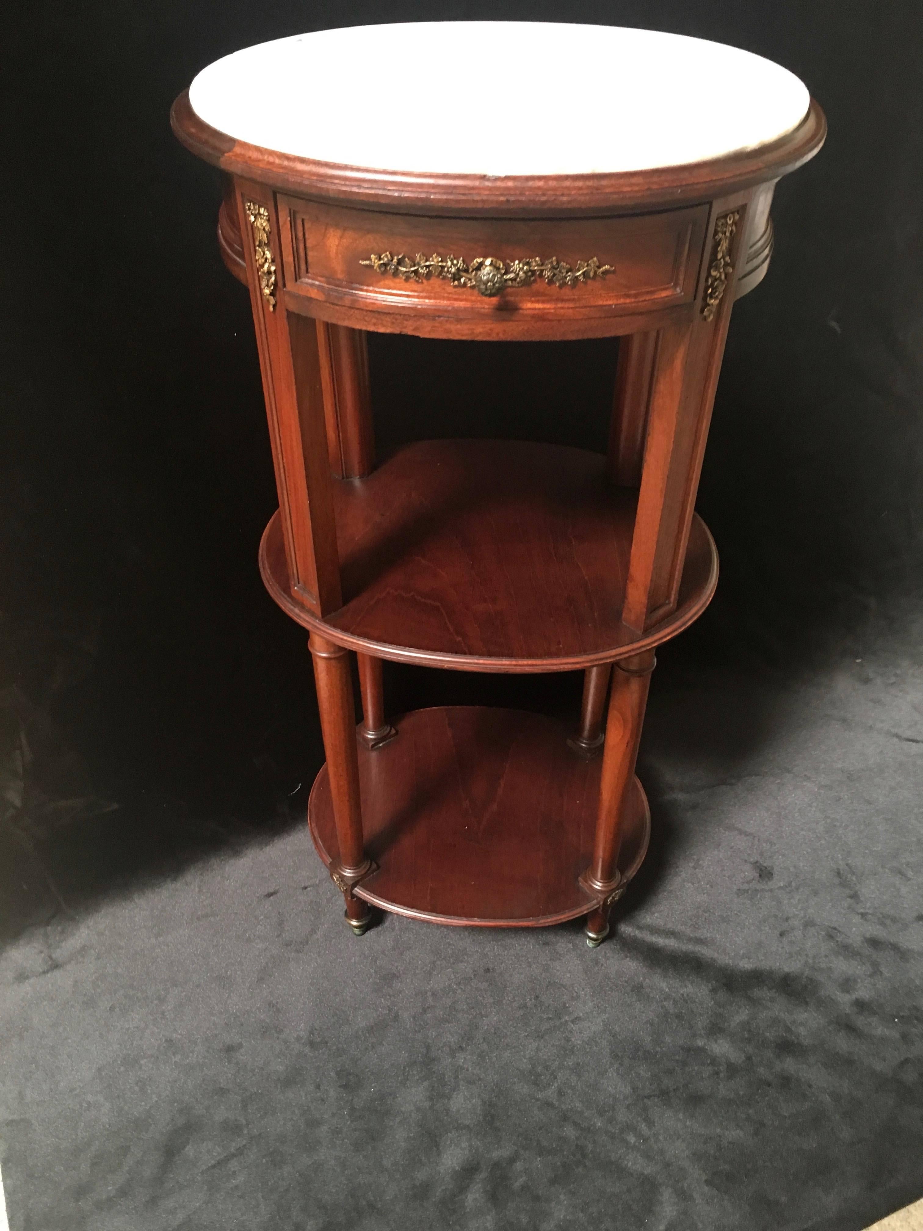 Bronze Louis XVI Style Three-Tiered Table by F. Blondeau For Sale