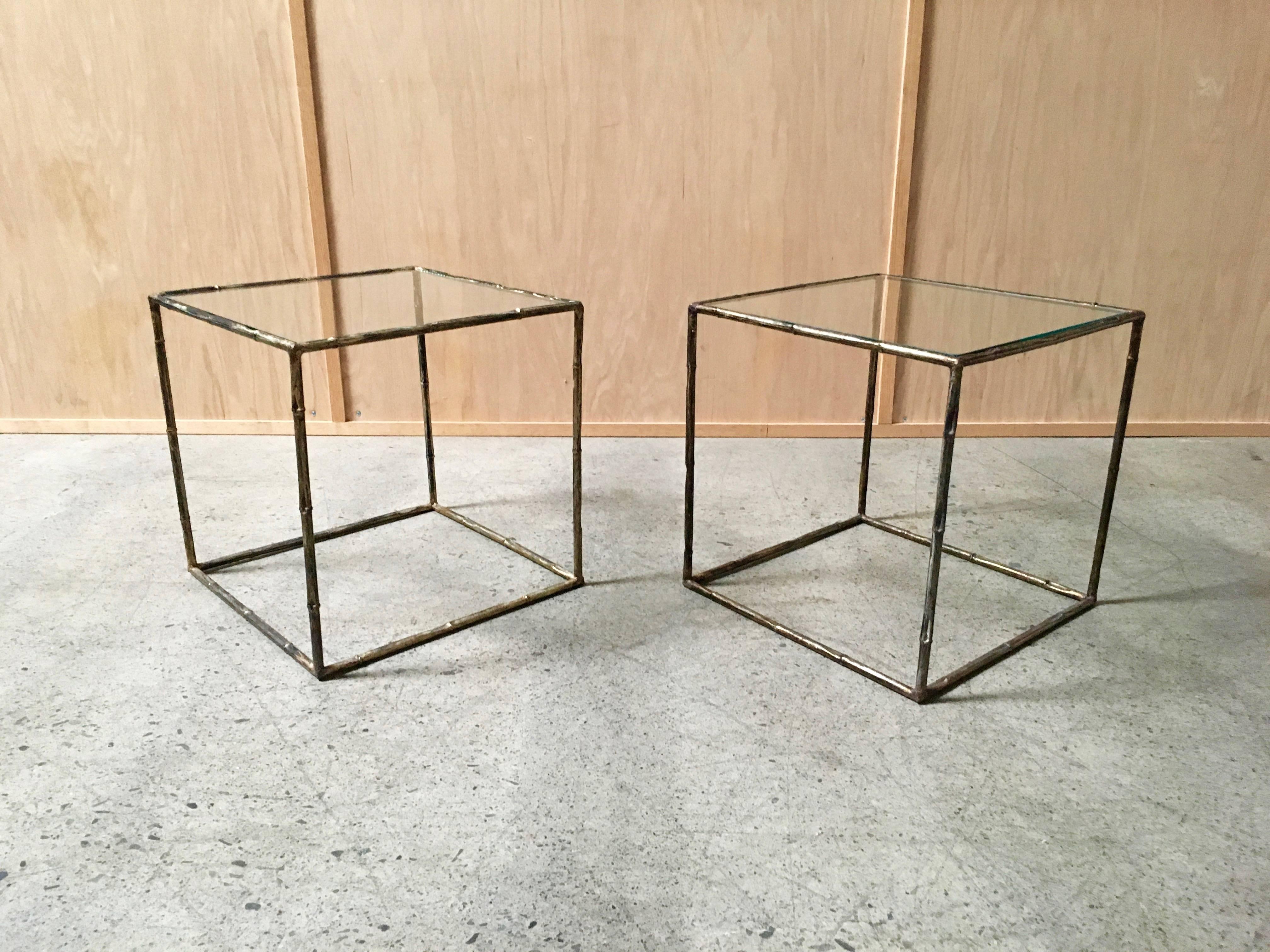 Pair of geometric cube faux bamboo end tables metal with glass tops.