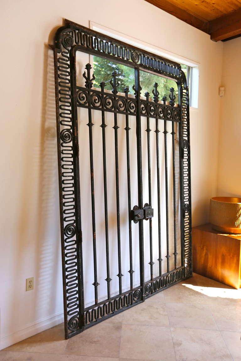 Monumental French iron gates or doors, hand forged with great patina.