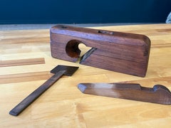 Antique handcrafted wood plane 9.5 inches long with a forged steel cutting blade