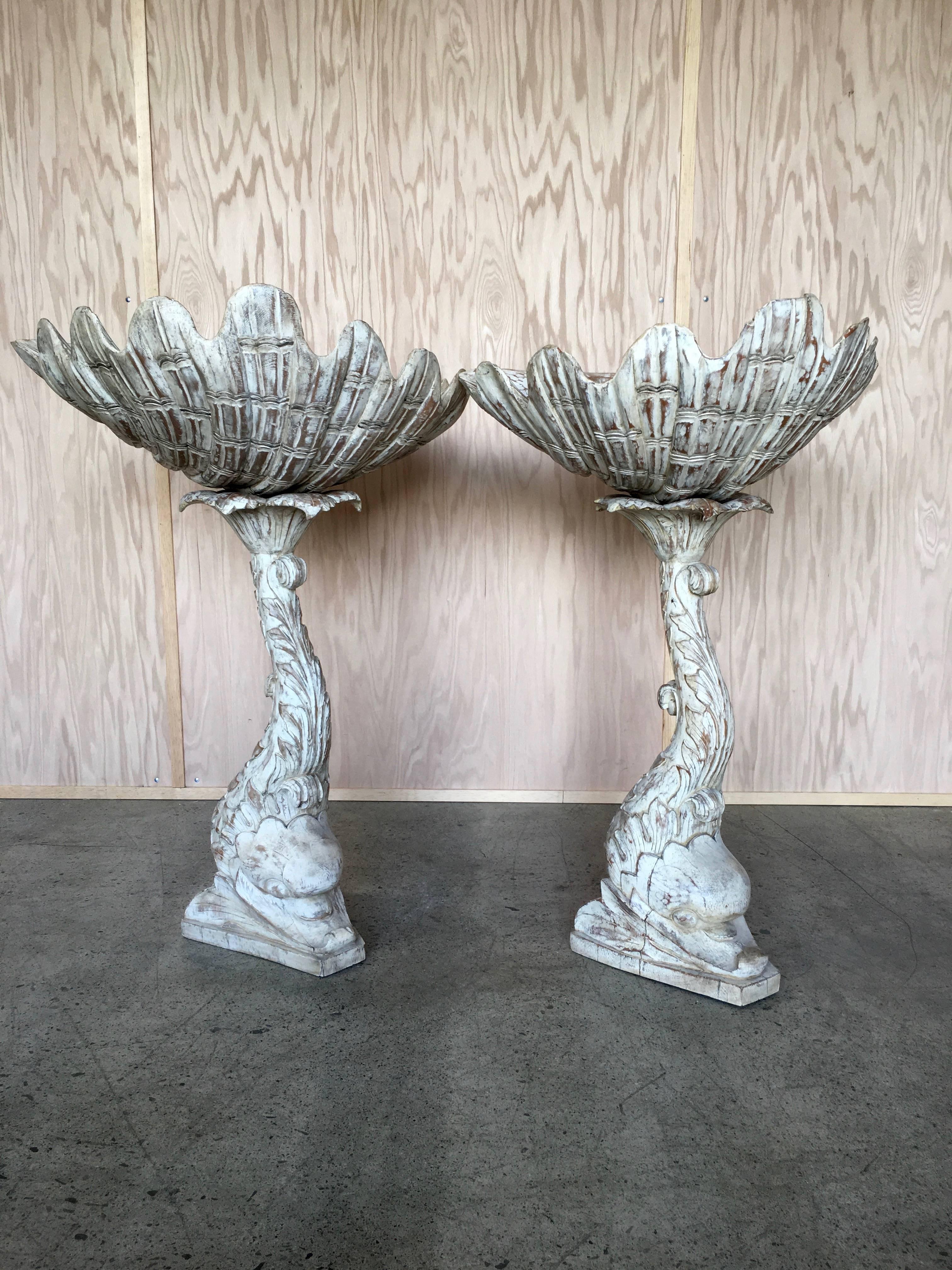 Pair of Grotto Fern stands with shell and Dolphin carving.