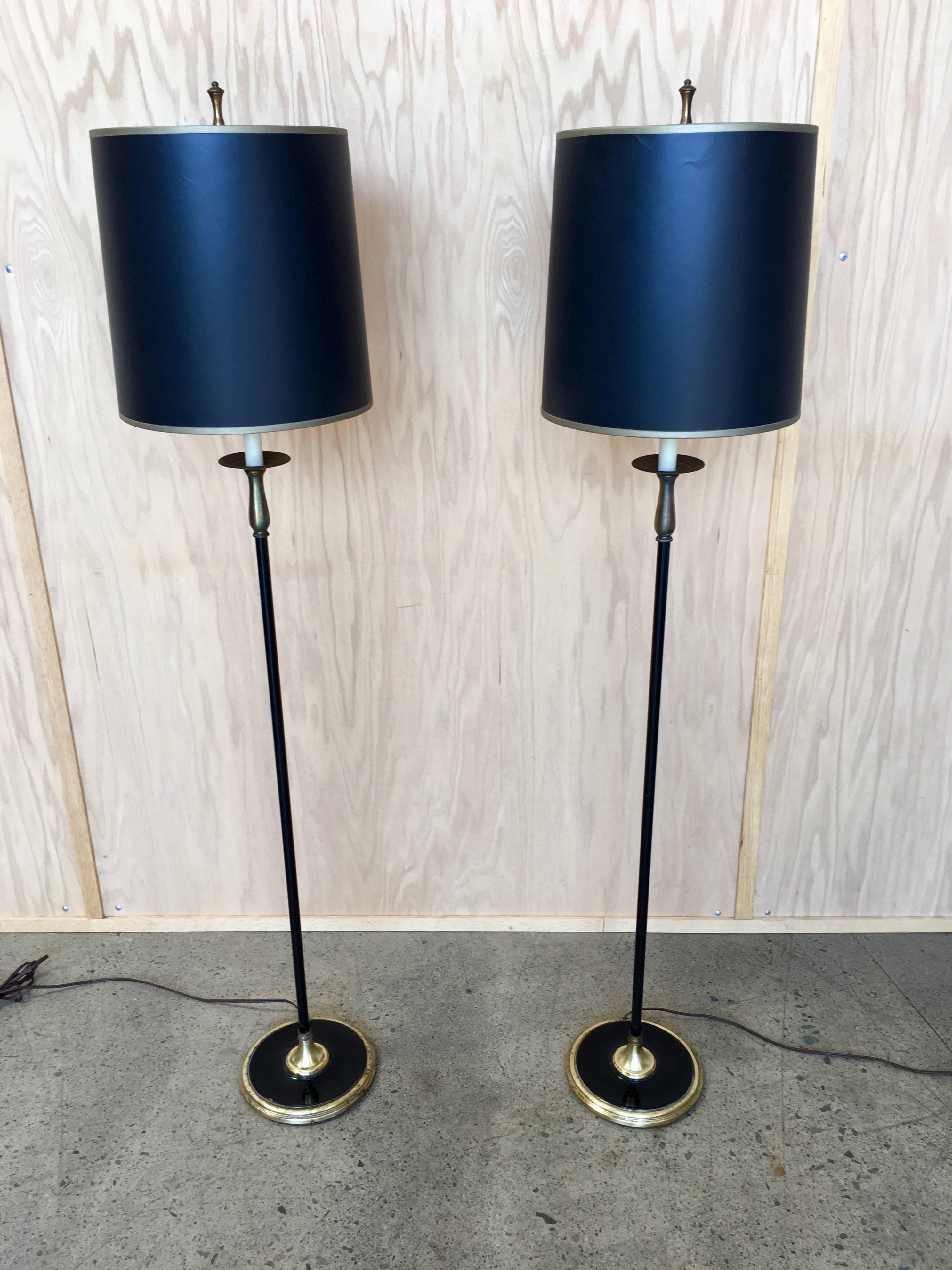 Pair of 1950s French style floor lamp with patina brass and painted steel.