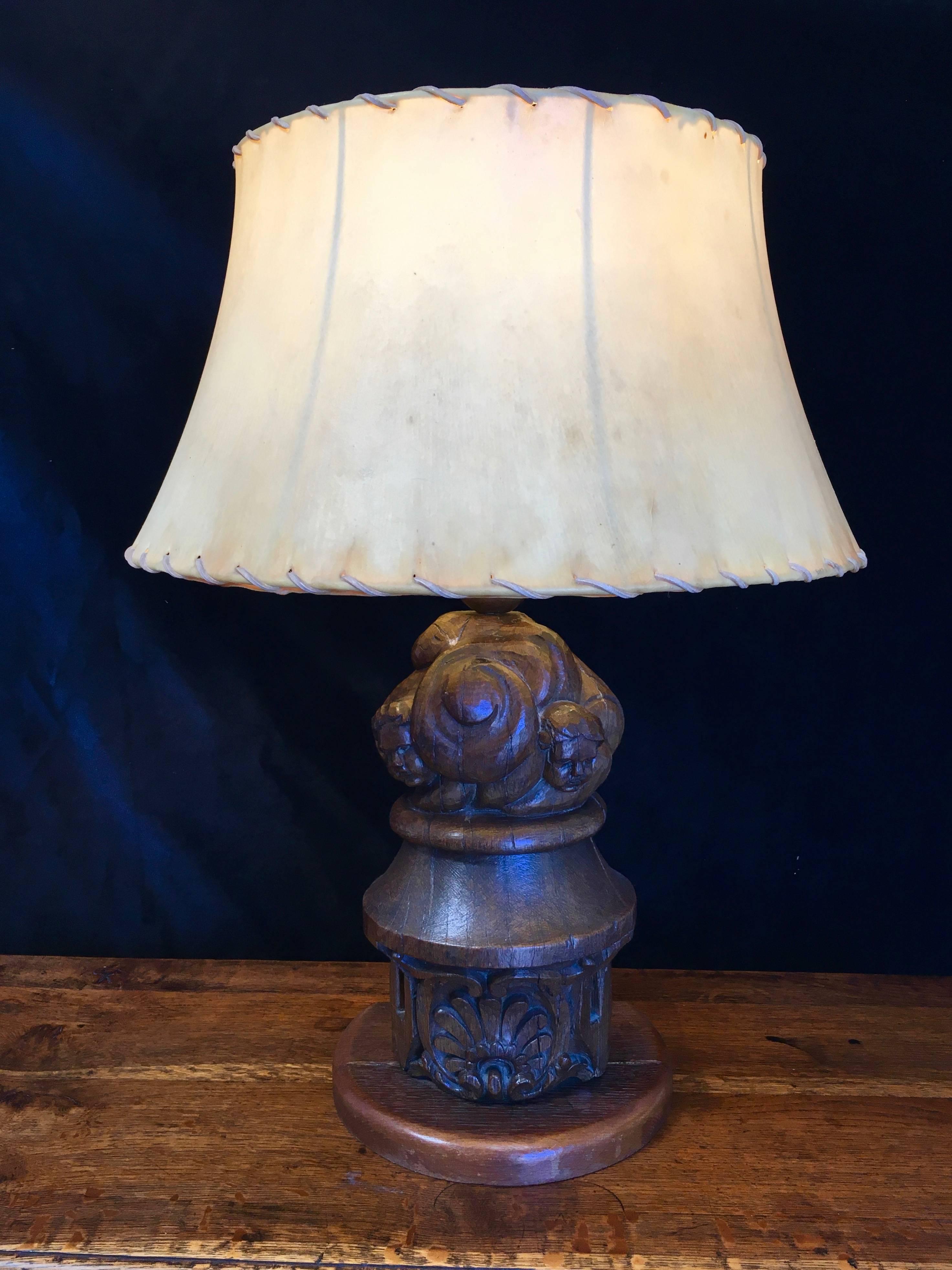 18th century antique architectural element converted to a lamp with vellum shade 
Angels in the clouds.