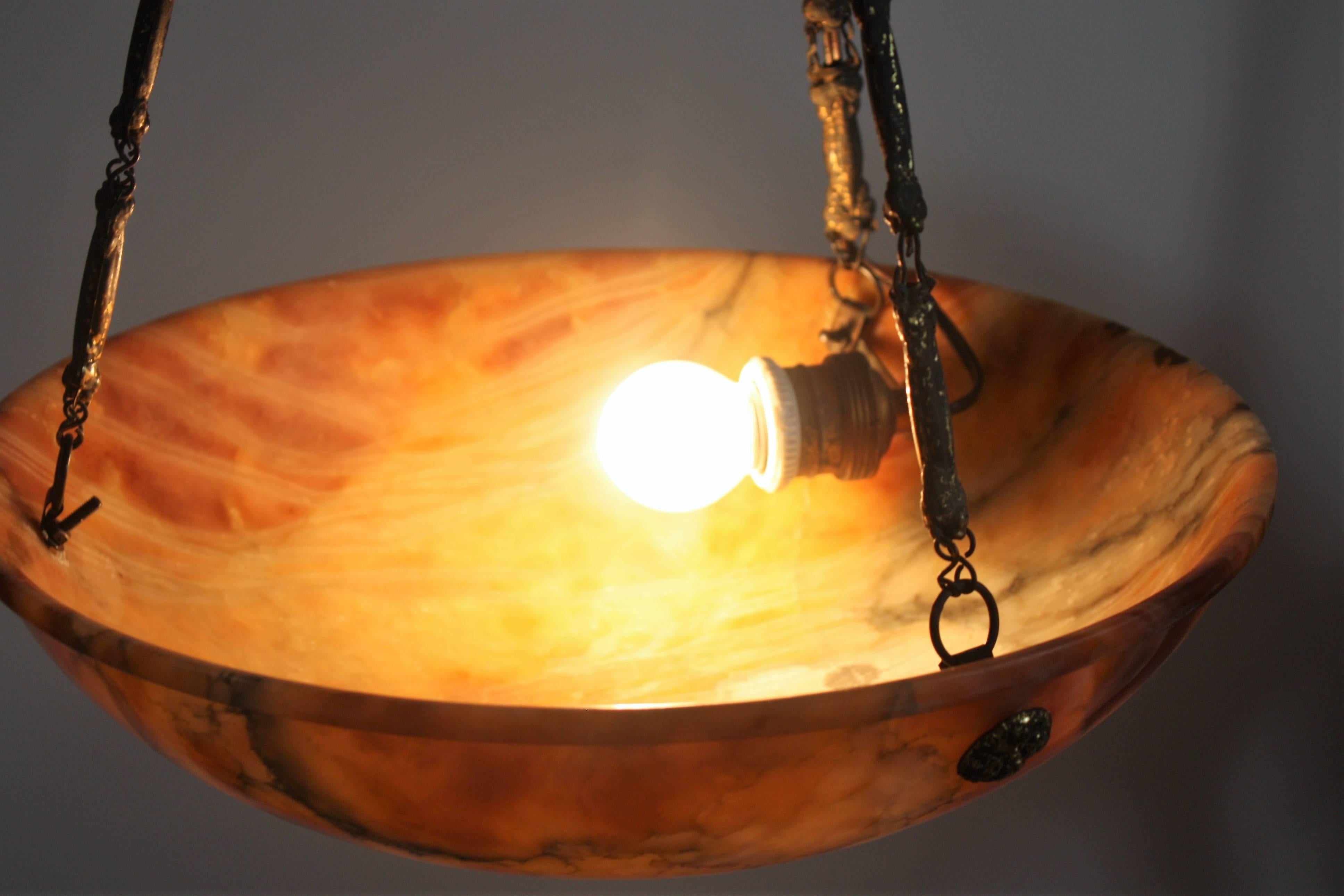 Beautiful french one-light alabaster pendant on brass frame.
France, circa 1925.
Socket: 1 x E 27  for standard screw bulbs
