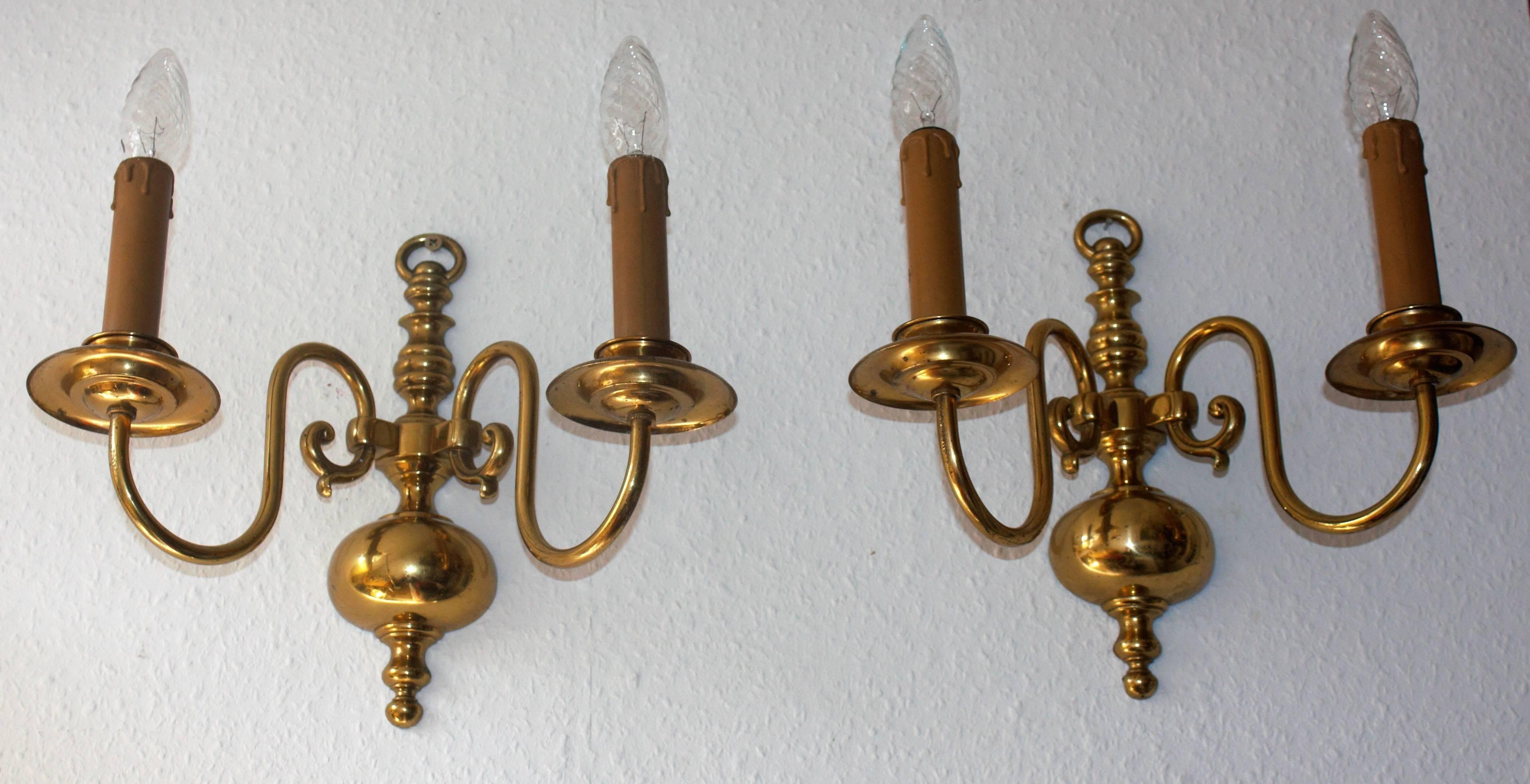 Elegant pair of wall lights in the style of Baroque, Germany, circa 1940s.
Each two Edison (e14) socket for standard screw bulbs.
Very good condition with old patination.