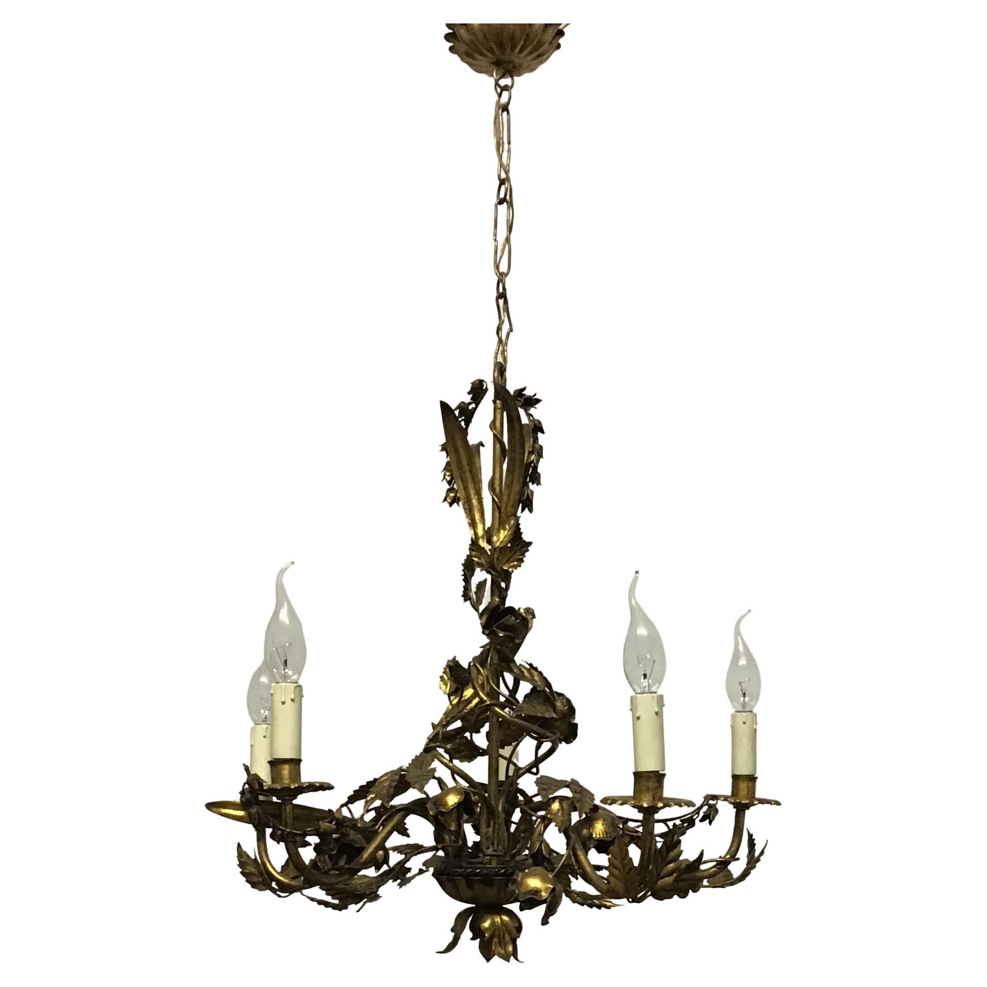Ann Italian gilt iron six-light chandelier with leaves and roses, circa 1940s.
Socket: 6 x e14 for standard screw bulbs.


